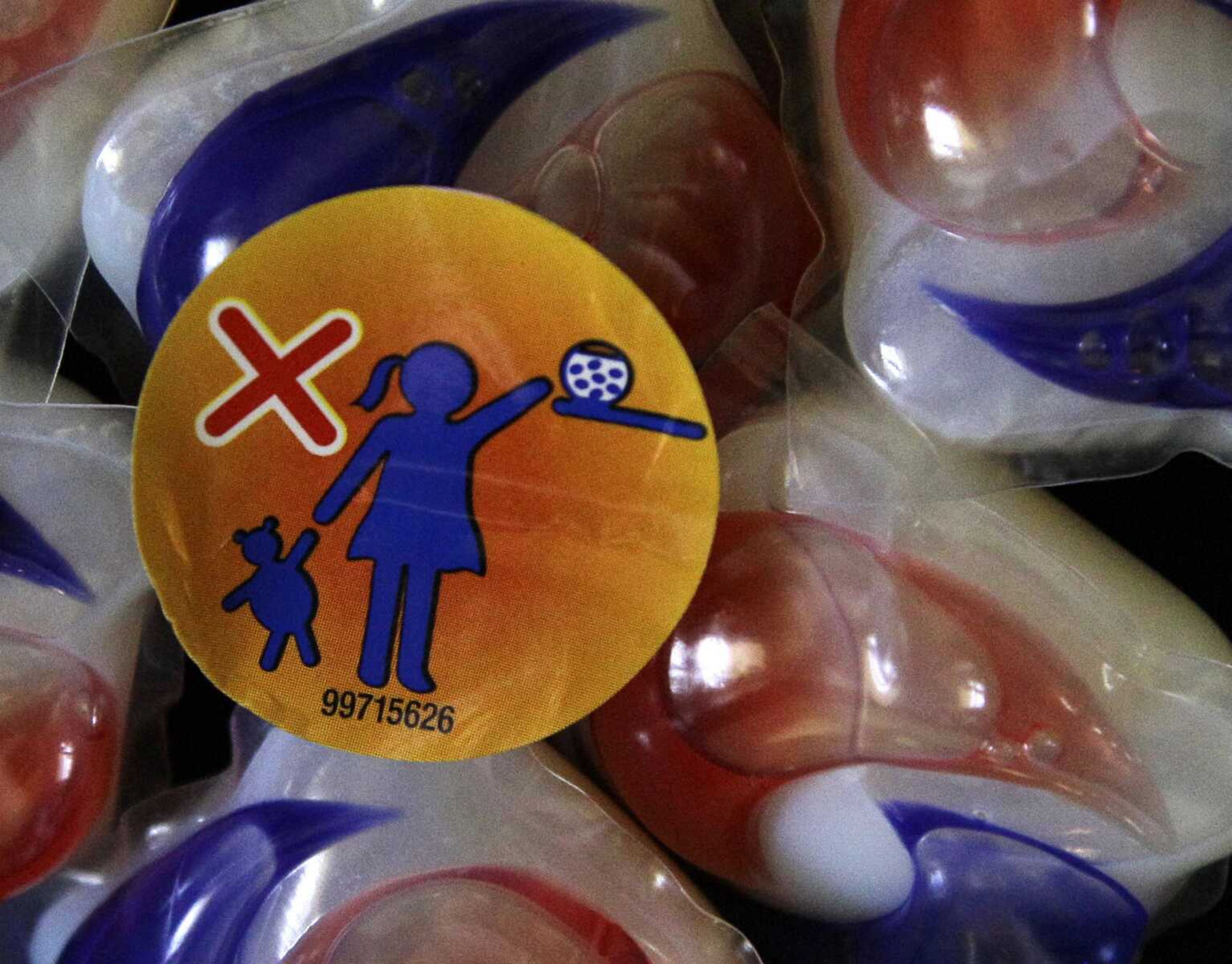 This file photo shows a package of Tide laundry detergent packets in Houston.