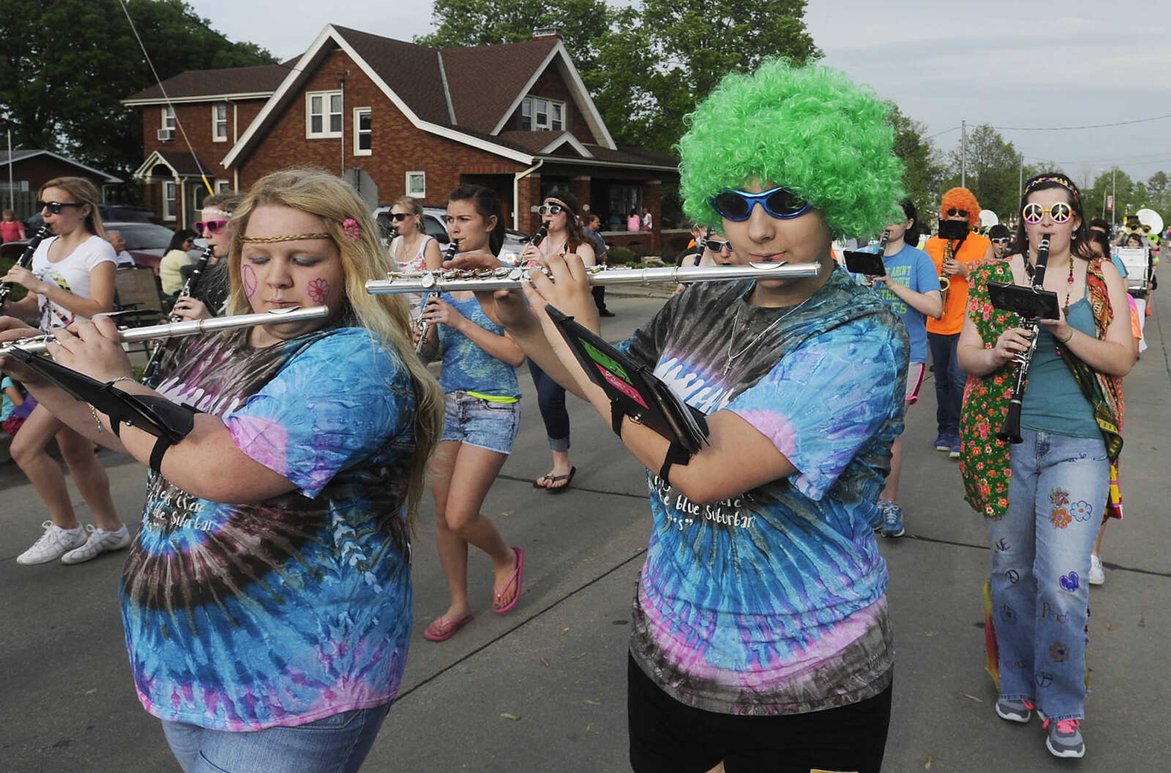 The Perryville High School Marching Band performs during the Perryville Mayfest Parade Friday, May 10, in Perryville, Mo. This year's Mayfest theme is Peace, Love, Perryville Mayfest.