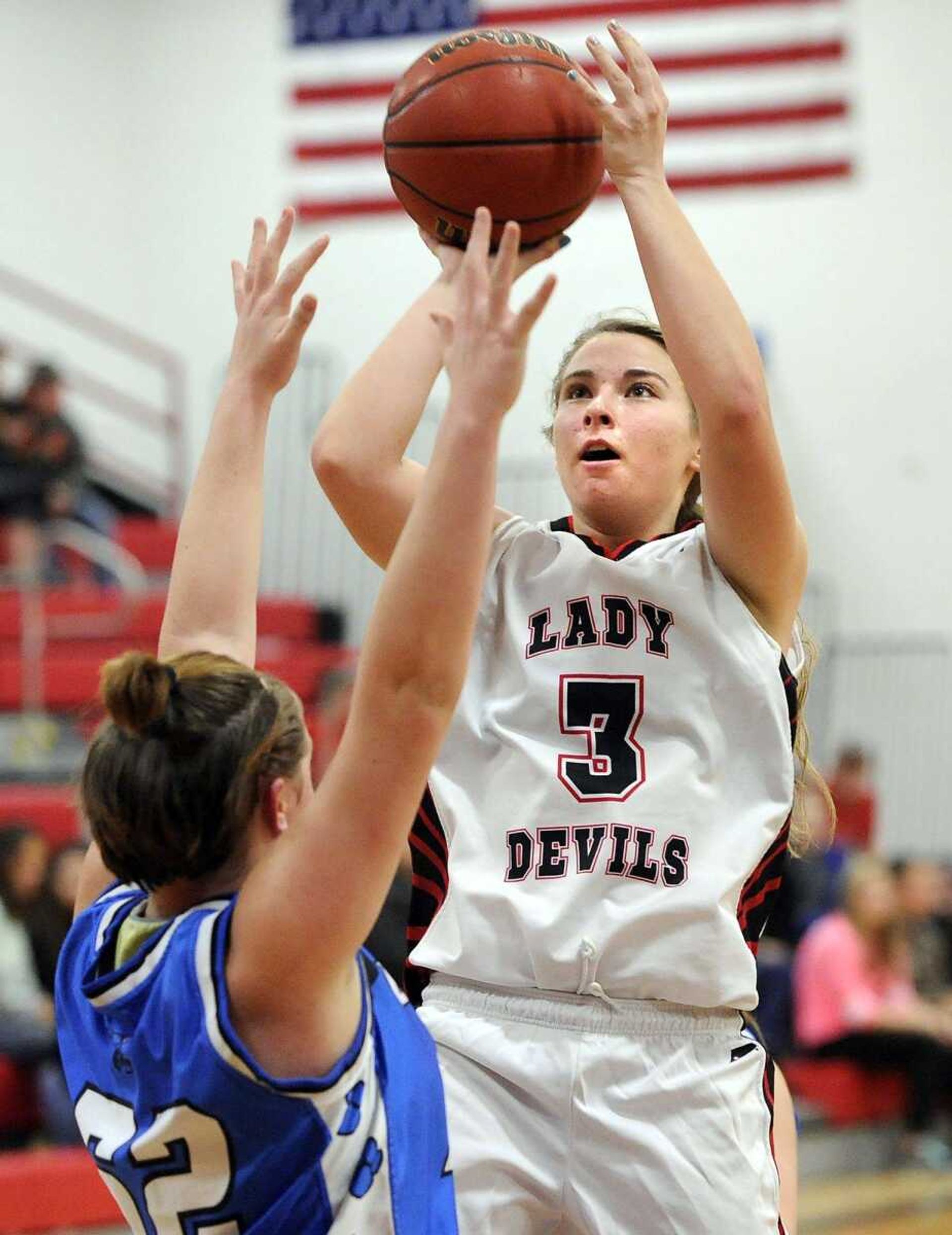 Chaffee's Julia Sutterfield takes a shot as Delta's Kiley Wicker defends during the third quarter of a first-round game in the Scott-Mississippi Conference Tournament on Tuesday, Jan. 12, 2016 in Chaffee, Missouri. (Fred Lynch)