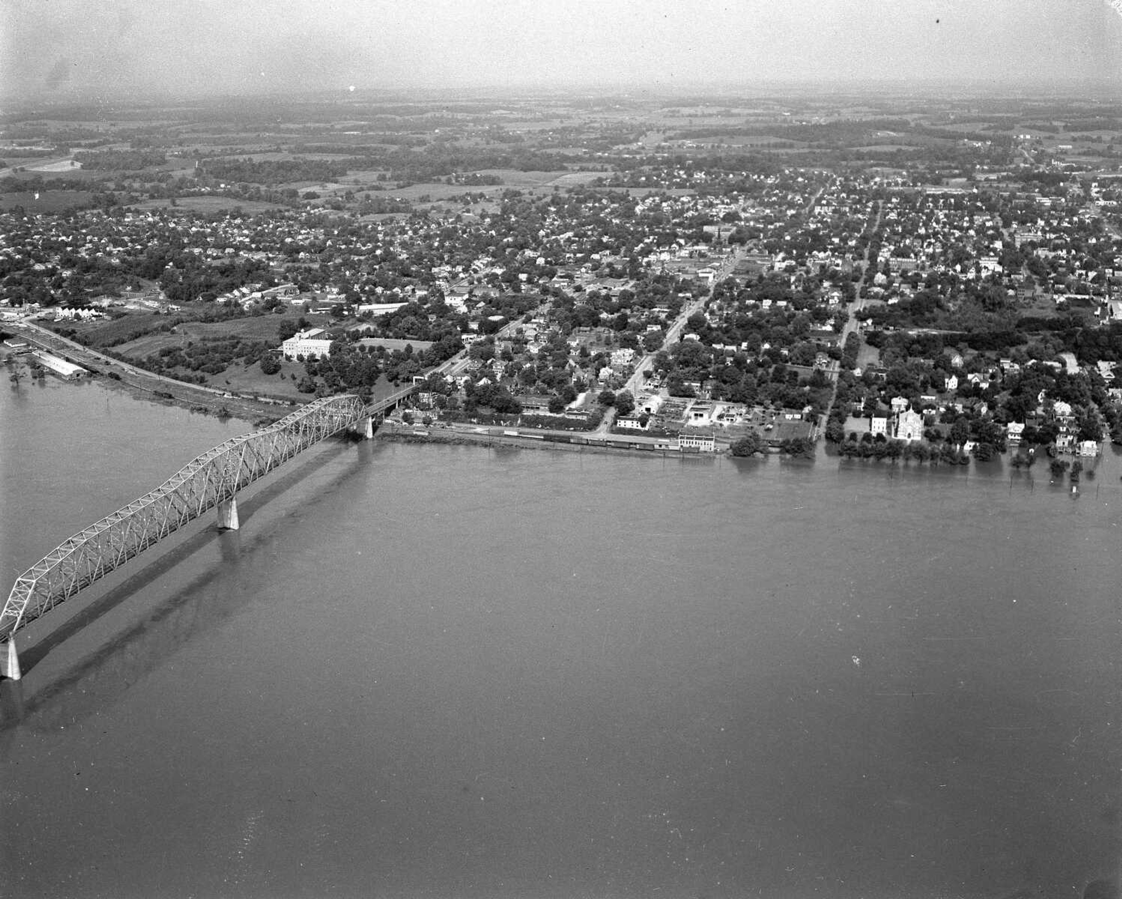 The Cape Girardeau river bridge is to the left during a time of flooding along the Mississippi.