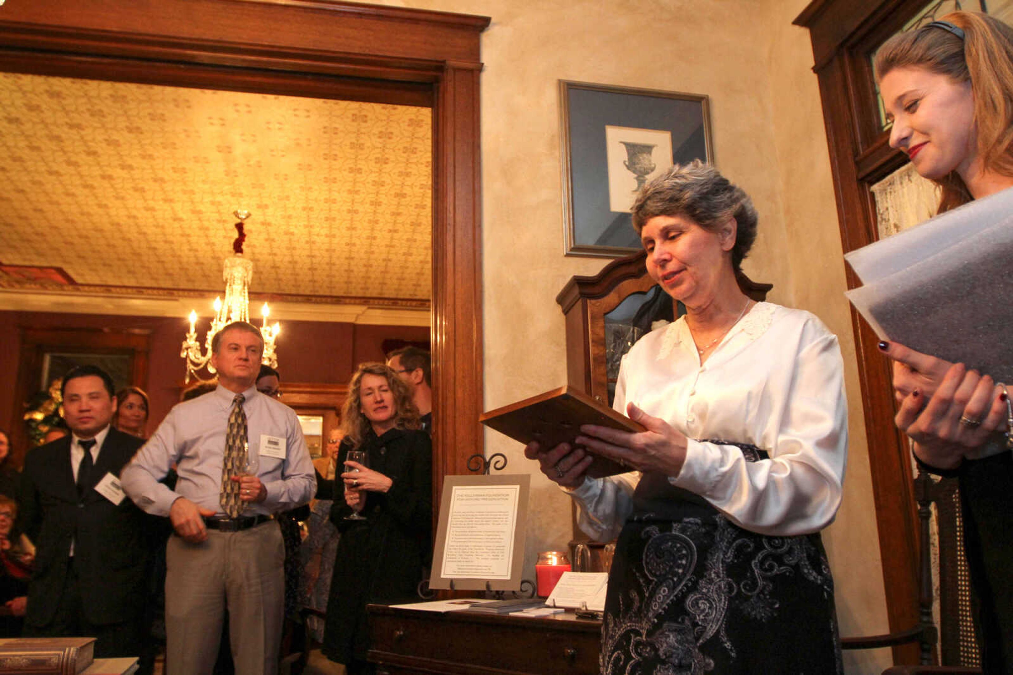 GLENN LANDBERG ~ glandberg@semissourian.com


Brenda S. Seyer accepts the Otto F. Dingeldein award during the second annual Dingeldein Gala at the Oliver-Leming House Friday, Jan. 16, 2014.