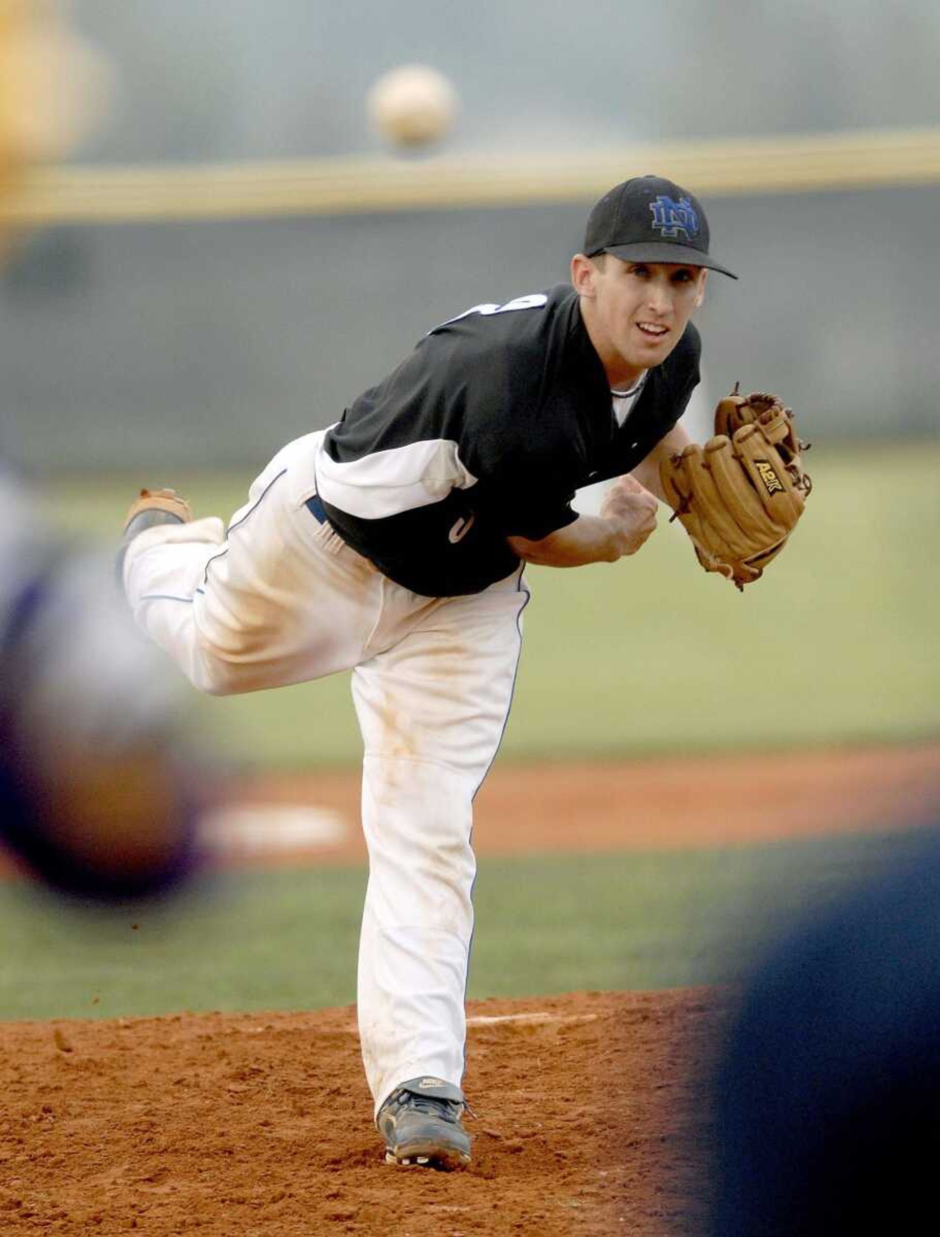 Notre Dame's Colton Young makes a pitch in the sixth inning against Potosi May 26 at Notre Dame. (Elizabeth Dodd)