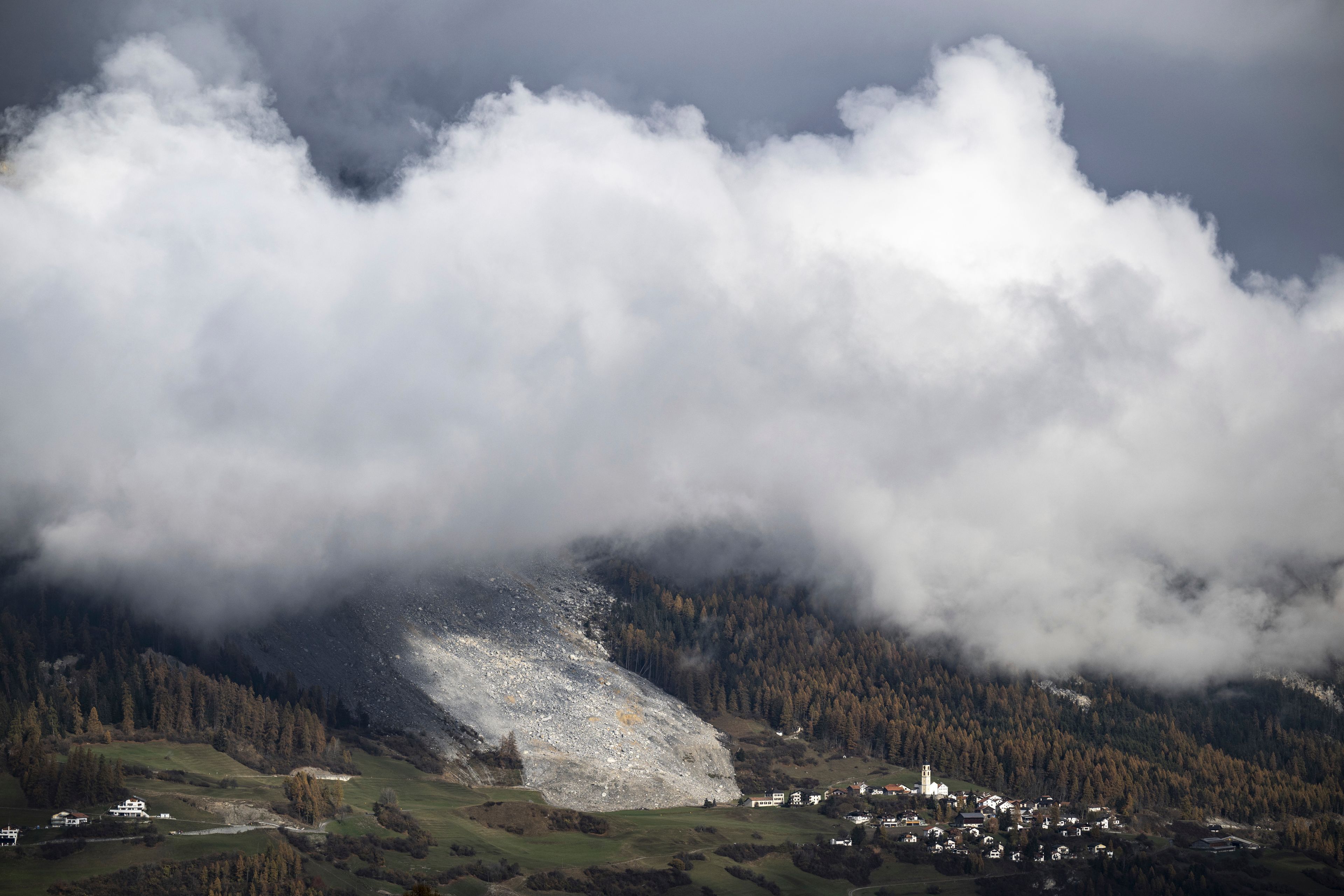 A view of a landslide next to Brienz, Tuesday, Nov. 12, 2024, in Brienz-Brinzauls, Switzerland. (Gian Ehrenzeller/Keystone via AP)