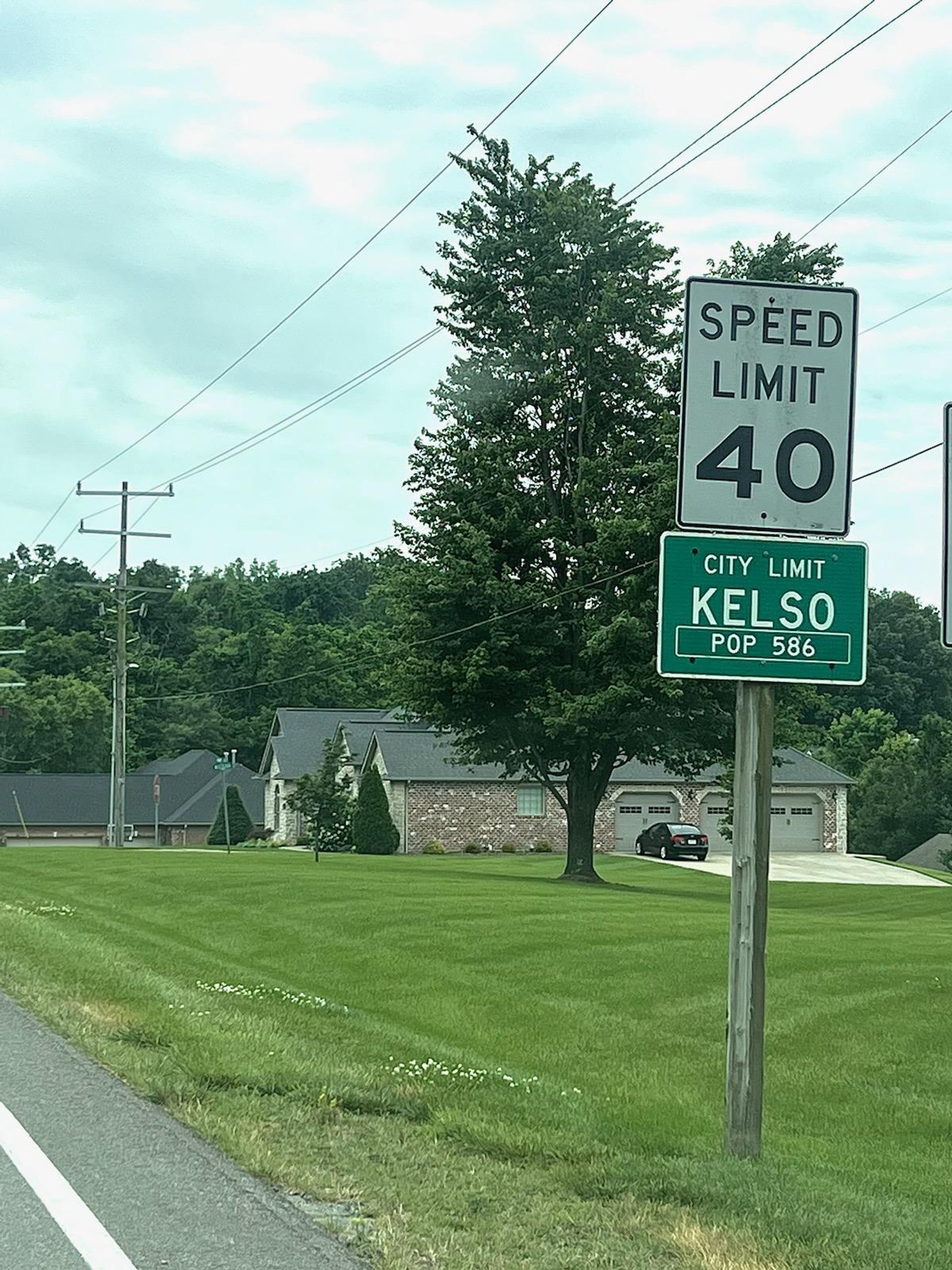 The city limits sign of Kelso.