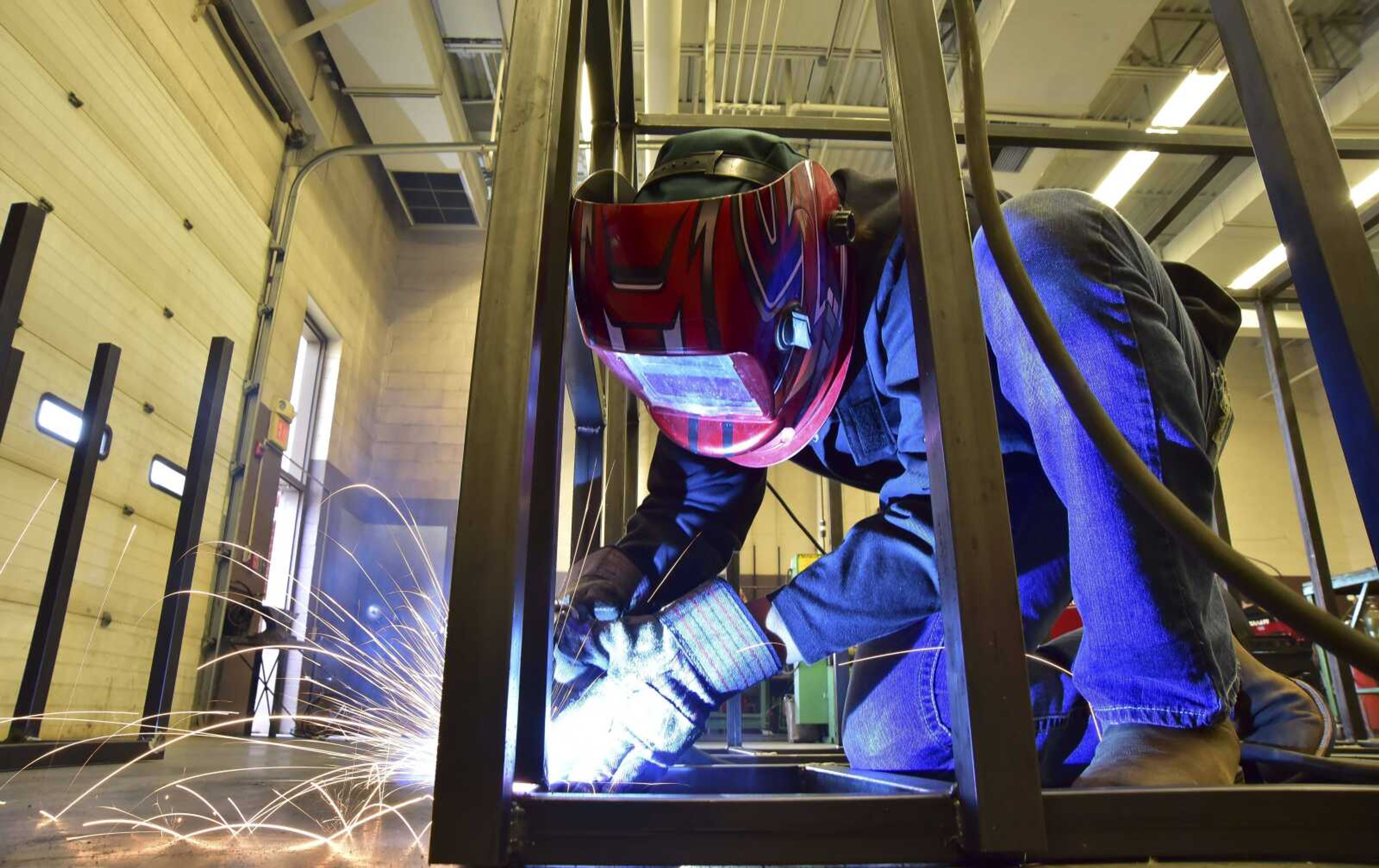 Dalton Scott, 17, welds together metal to be built for a deer blind capable for hunters with disabilities Tuesday, Oct. 25, 2016 at the Career and Technology Center in Cape Girardeau.