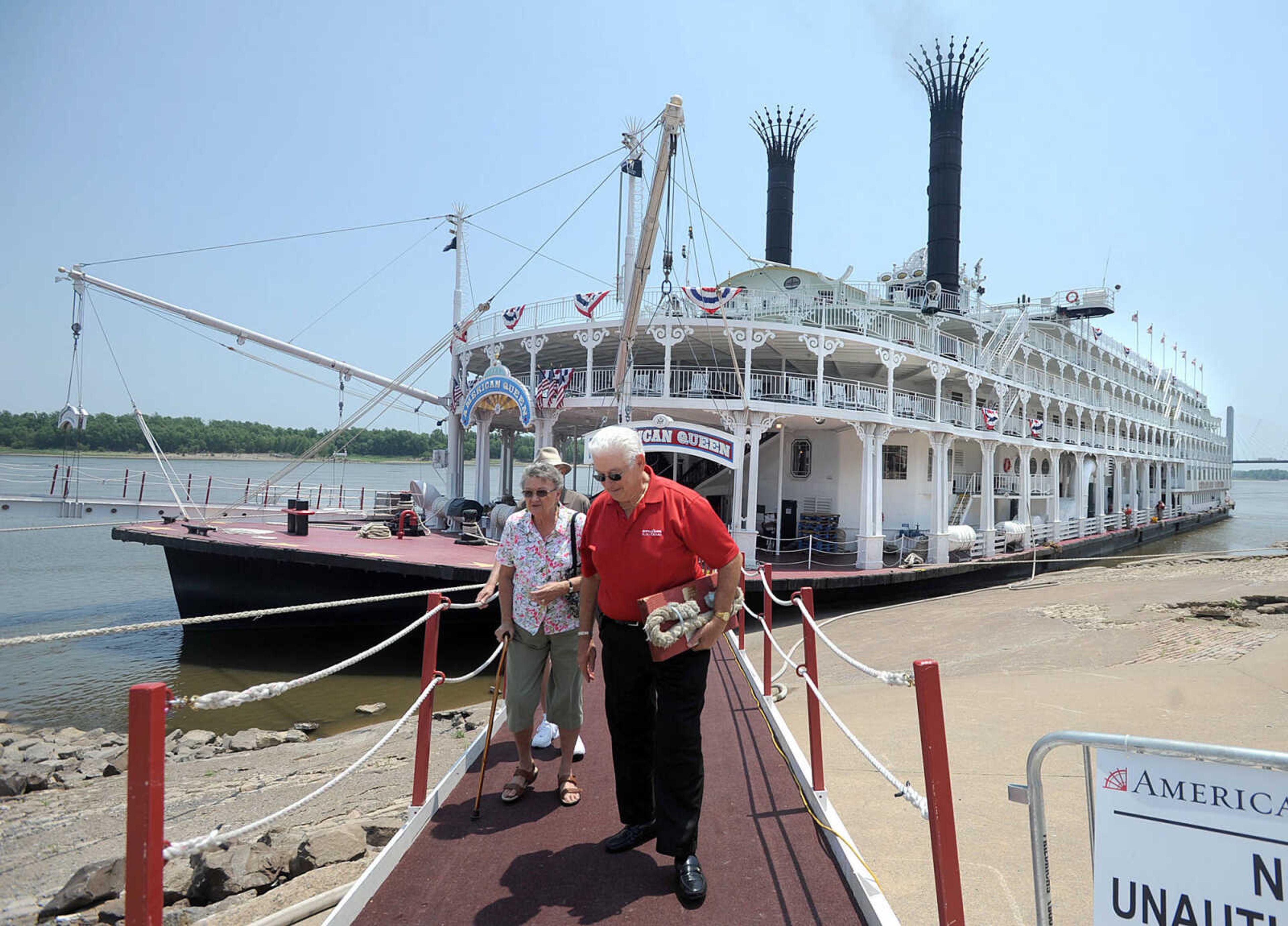 LAURA SIMON ~ lsimon@semissourian.com
Cape Girardeau mayor Harry Rediger speaks to passengers after his tour of the American Queen Monday, July 2, 2012 in downtown Cape Girardeau.