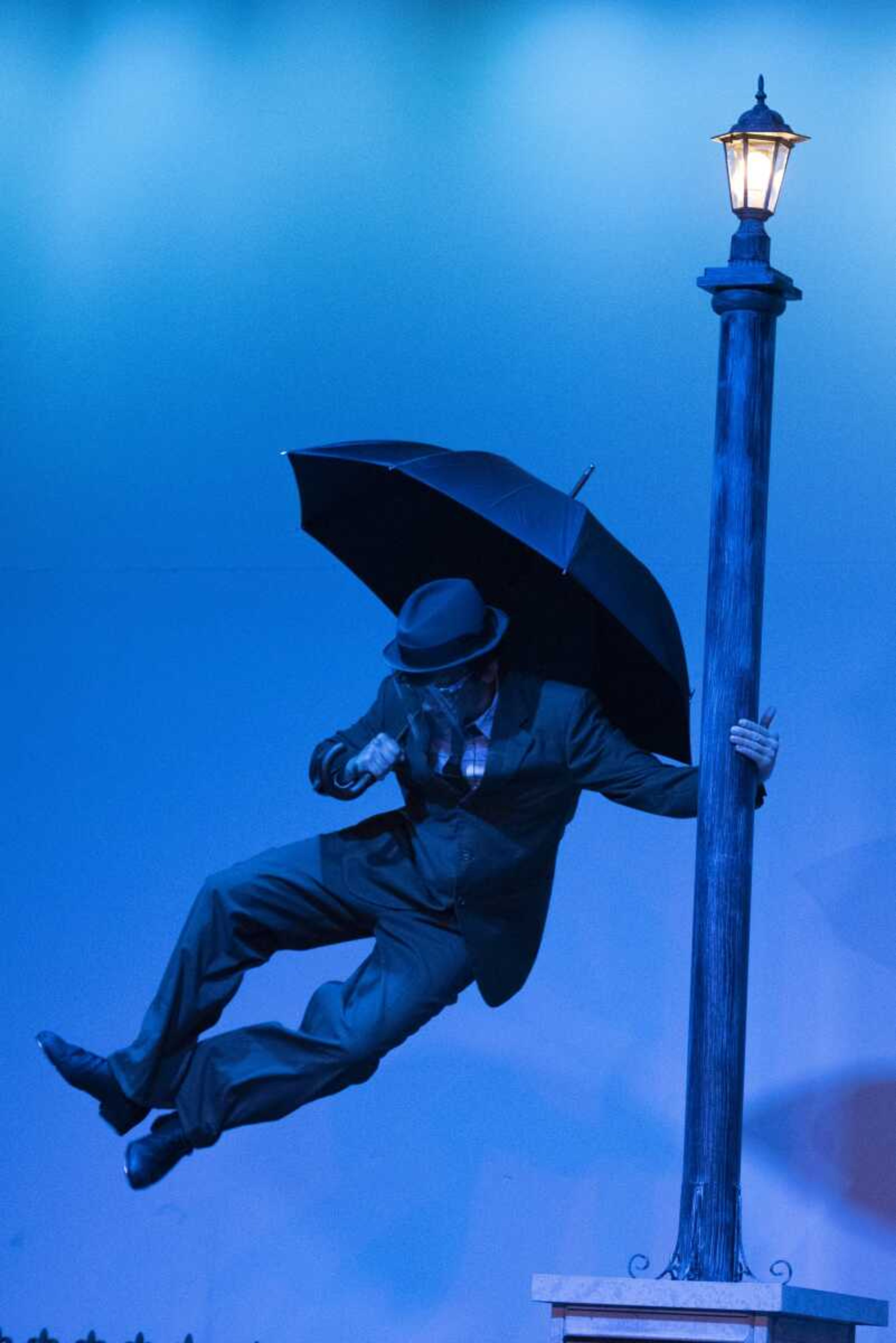 Slaten Vowels as Don Lockwood performs  Singin  in the Rain  during a dress rehearsal of  Singin  in the Rain  at Notre Dame Regional High School in Cape Girardeau.