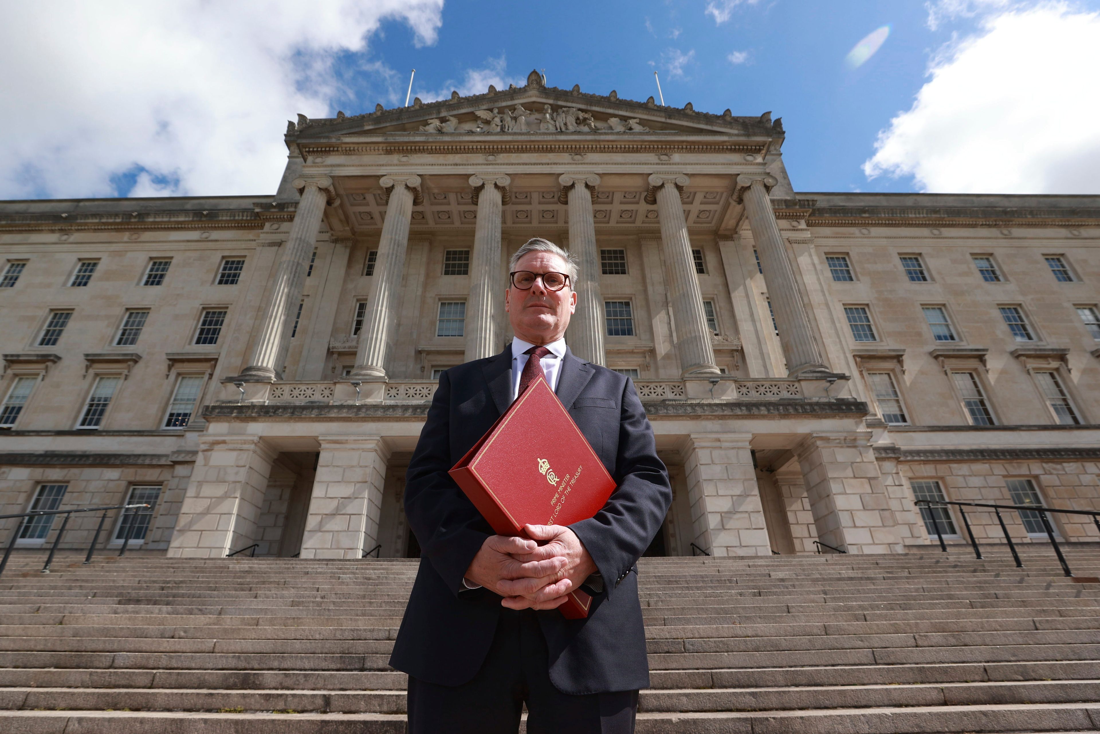 FILE - Britain's Prime Minister Sir Keir Starmer poses for a photo outside Parliament Buildings, following a meeting with party leaders, during his tour of the UK following Labour's victory in the 2024 general election, in Stormont, Belfast, Monday July 8, 2024. (Liam McBurney/Pool Photo via AP, File)