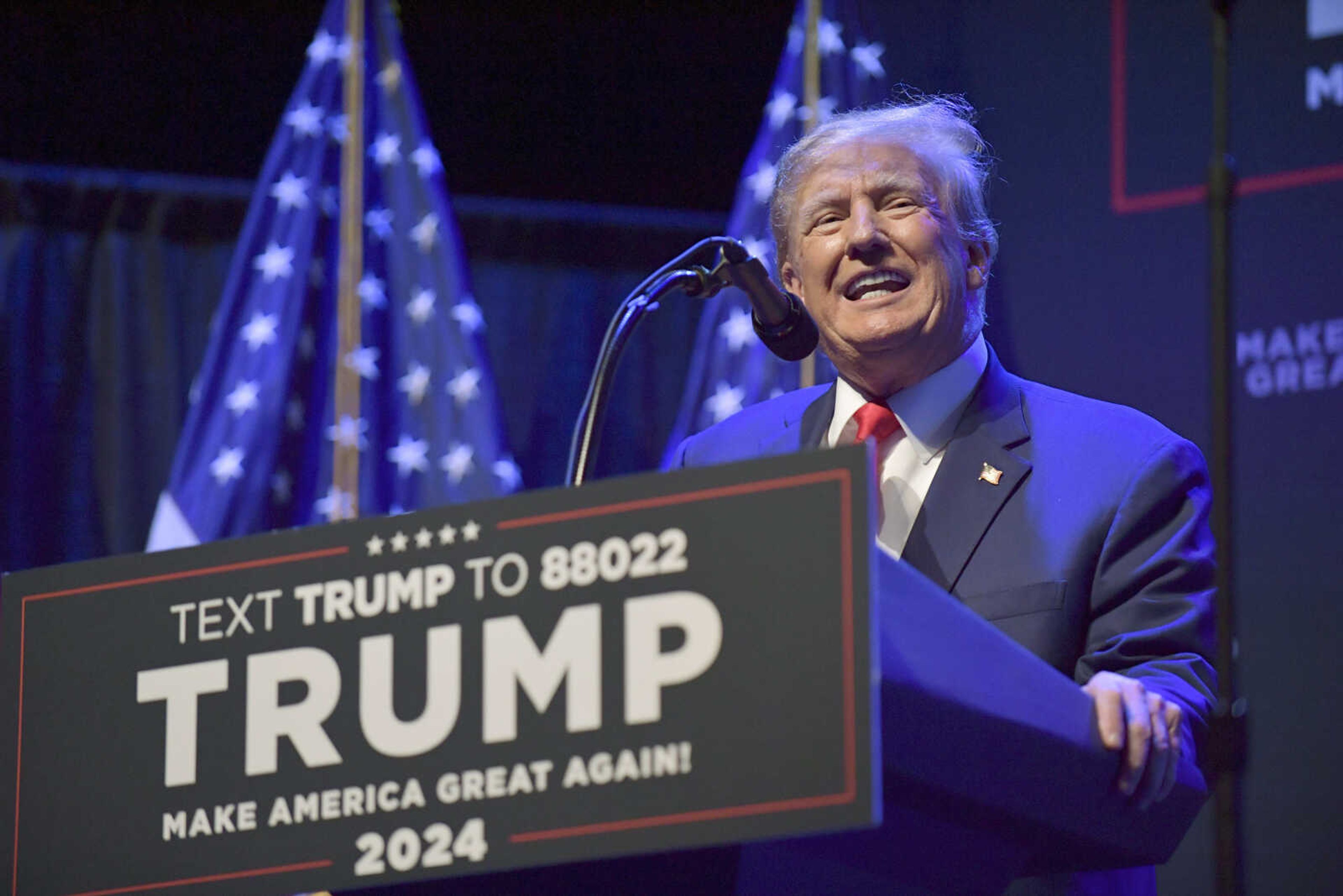 Former President Donald Trump speaks at a campaign event March 13in Davenport, Iowa. Trump's campaign reported raising more than $18.8 million between his main campaign account and a joint fundraising account over the first three months of the year. On top of the money he raised in that first quarter, his campaign said $15.4 million came in starting in April after he was indicted in New York.