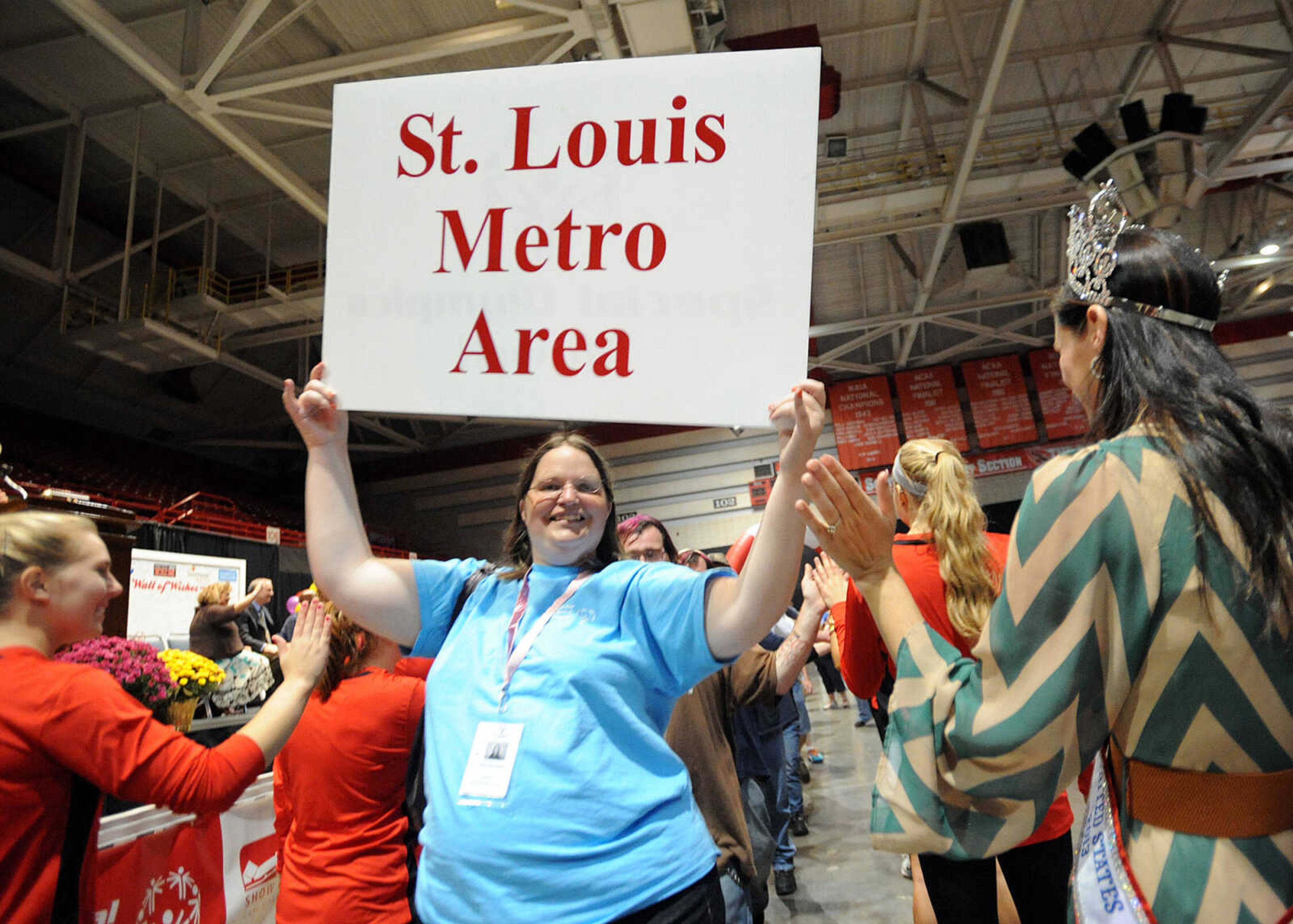 LAURA SIMON ~ lsimon@semissourian.com

Special Olympic athletes are greeted by fans, the Knights of Columbus, and the Southeast Missouri State gymnastics team, Friday, Oct. 11, 2013 during the opening ceremony for the Special Olympics Missouri State Fall Games at the Show Me Center.