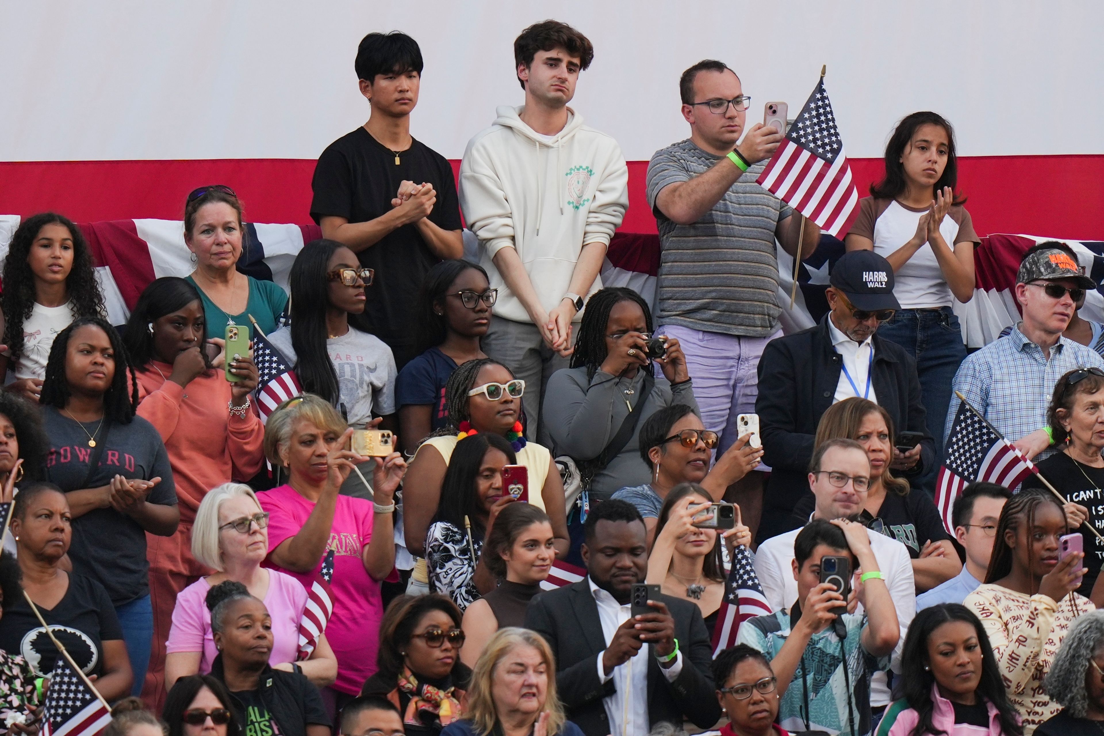 Supporters of Vice President Kamala Harris react as she delivers a concession speech for the 2024 presidential election, Wednesday, Nov. 6, 2024, on the campus of Howard University in Washington. (AP Photo/Stephanie Scarbrough)