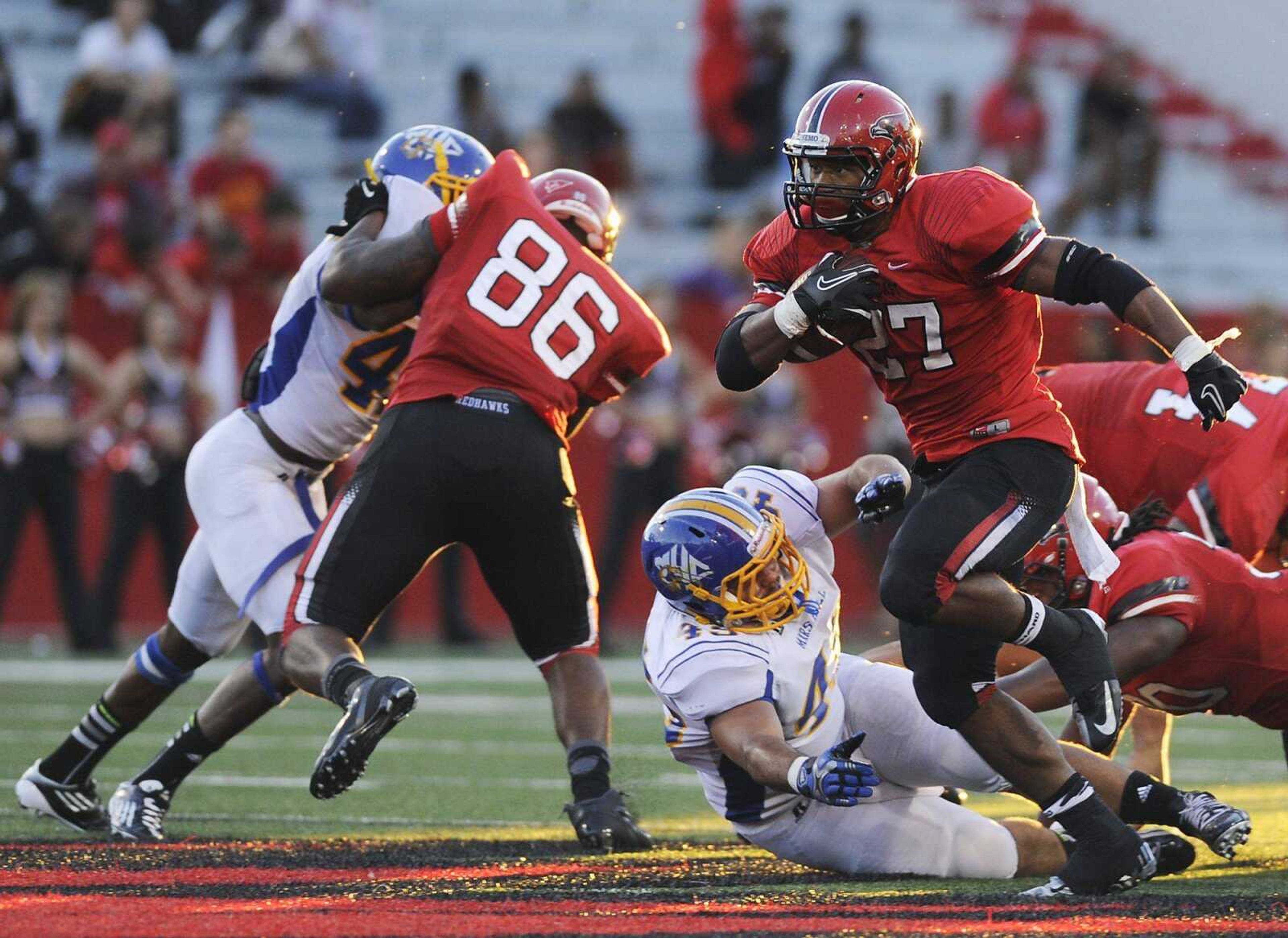 Southeast Missouri State running back Levi Terrell breaks through the Mars Hill defense during the Redhawks 30-18 win over the Lions Saturday. (ADAM VOGLER)