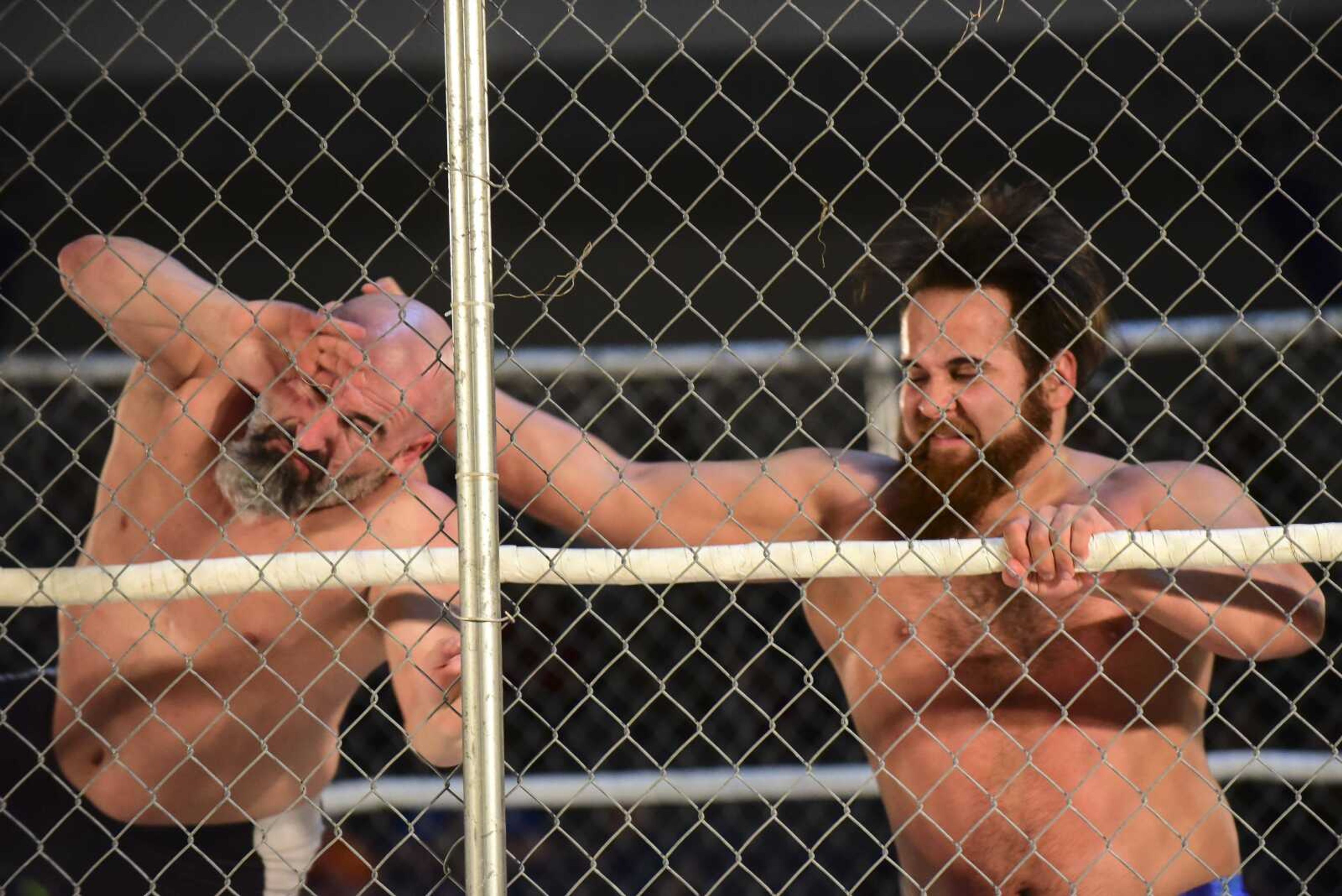 Tony Kozina and Brandon Espinosa wrestle during the Cape Championship Wrestling match Saturday at the Arena Building in Cape Girardeau.