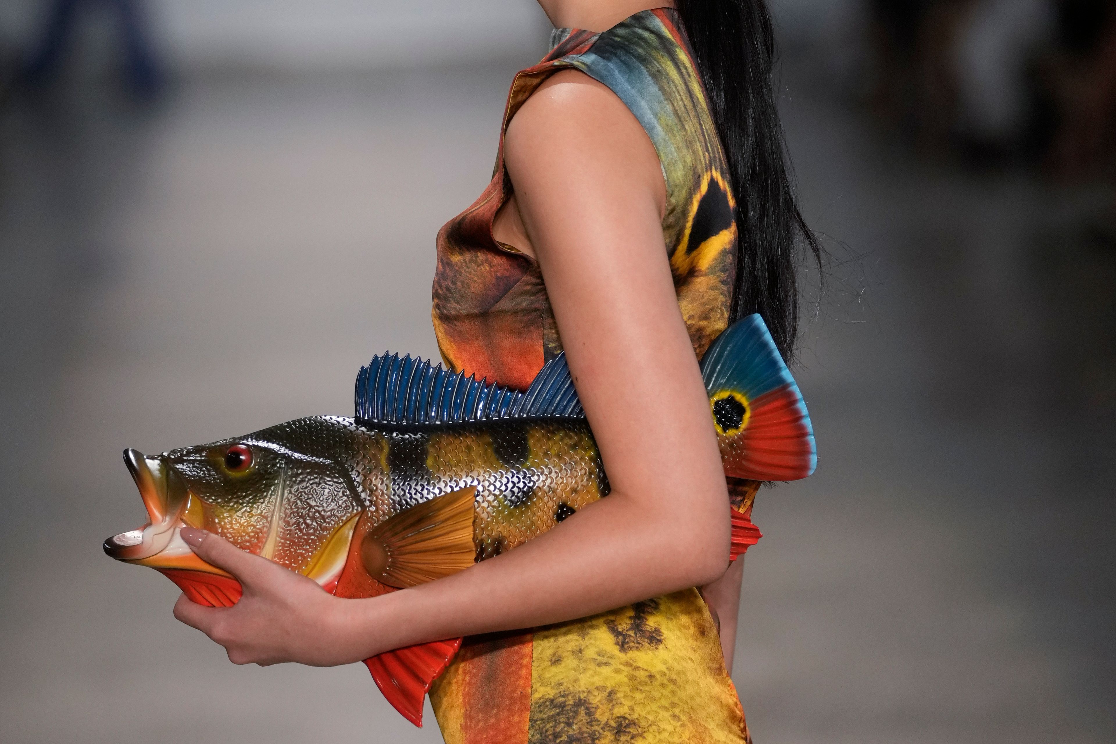 A model wears a creation from the Normando collection during Sao Paulo Fashion Week in Sao Paulo, Wednesday, Oct. 16, 2024. (AP Photo/Andre Penner)