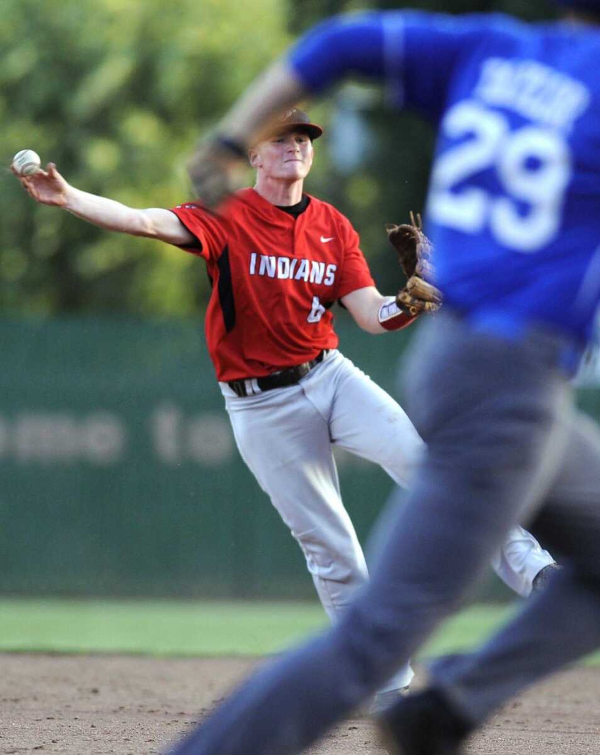 Jackson second baseman Jonathan Schumer throws to first base to retire the Hillsboro runner during the second inning of a Class 5 District 1 quarterfinal Monday, May 18, 2015 in Farmington, Missouri. (Fred Lynch)