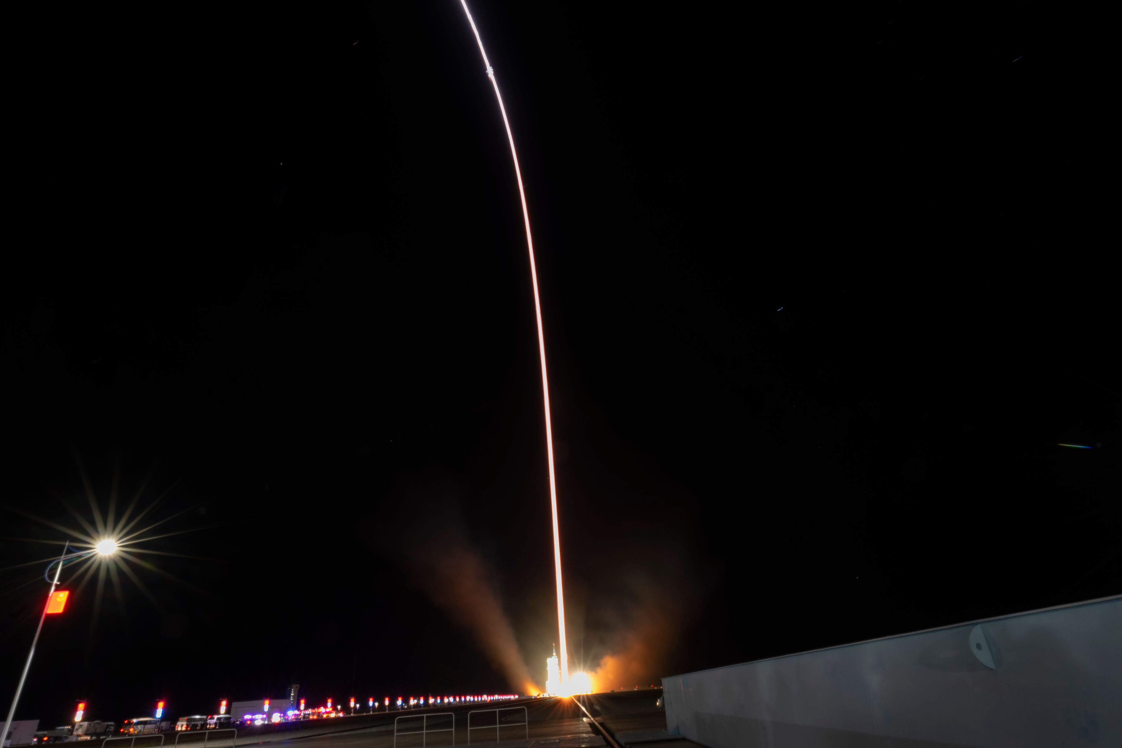 In this image taken with a long exposure, a Long March rocket with a Shenzhou-19 spacecraft atop takes off from the Jiuquan Satellite Launch Center in Jiuquan, northwestern China in the early hours of Wednesday, Oct. 30, 2024. (AP Photo/Ng Han Guan)