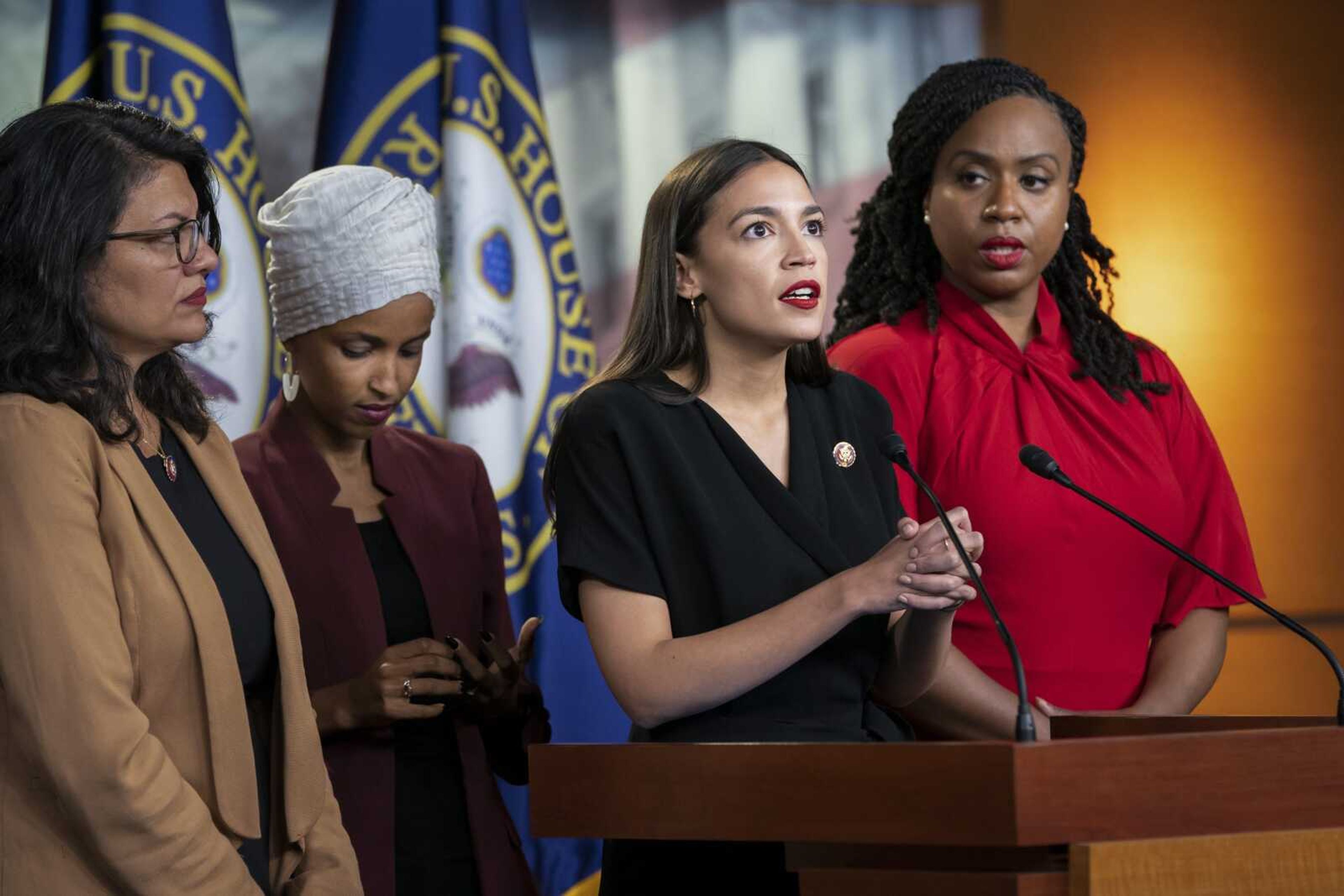 FILE - In this July 15, 2019, file photo, from left, Rep. Rashida Tlaib, D-Mich., Rep. Ilhan Omar, D-Minn., Rep. Alexandria Ocasio-Cortez, D-N.Y., and Rep. Ayanna Pressley, D-Mass., speak at the Capitol in Washington. All are American citizens and three of the four were born in the U.S. President Donald Trump told American congresswomen of color to 'Ã„Ãºgo back'Ã„Ã¹ to where they came from. He later vowed to revive a racial slur to tear down Elizabeth Warren, promoted a wild conspiracy theory linking a past political opponent to the death of a high-profile sex offender and blamed Friday'Ã„Ã´s stock market slide on a low-polling former presidential candidate. (AP Photo/J. Scott Applewhite, File)