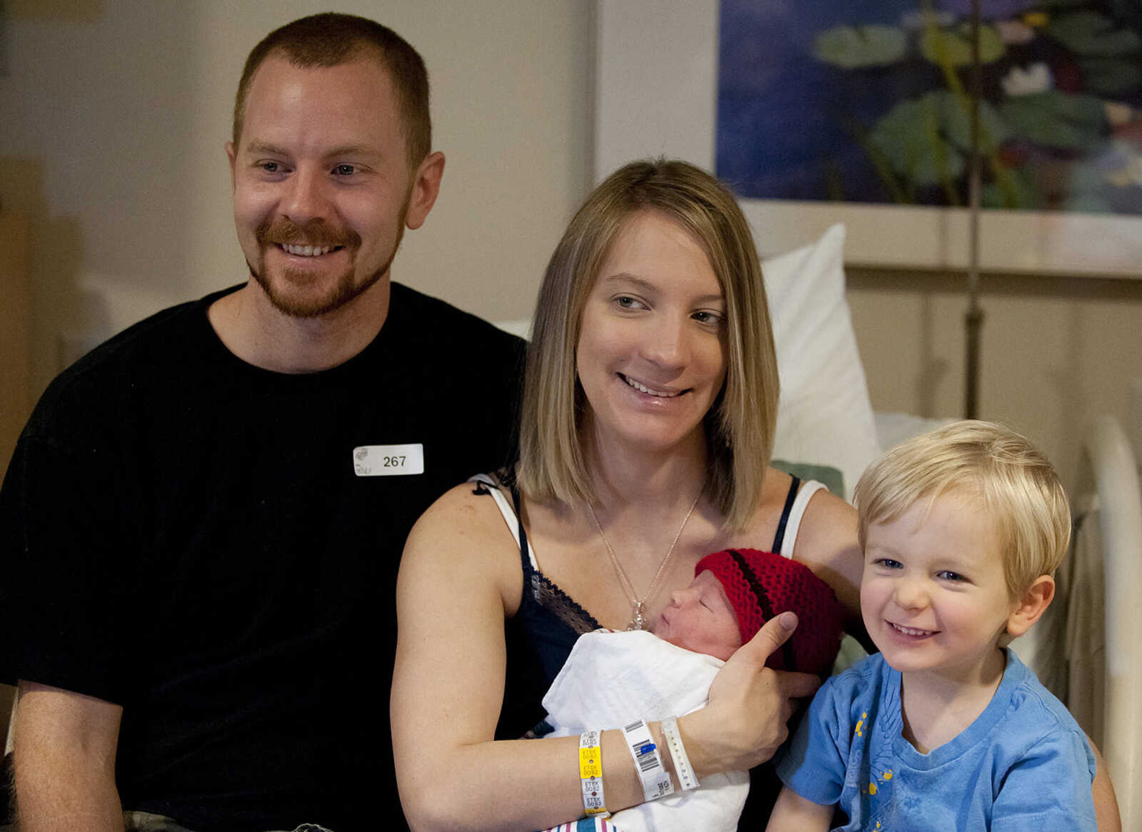 Adam, Leah, Chase, 3, and Tucker Isaiah Henley, who was born at 12:59 a.m. Wednesday, Jan. 1, pose for a photo at Southeast Hospital. Tucker weighs seven pounds, eleven ounces and wasn't due for a couple of more weeks. "Two and a half weeks early, he's healthy and we are extremely happy," said Leah.