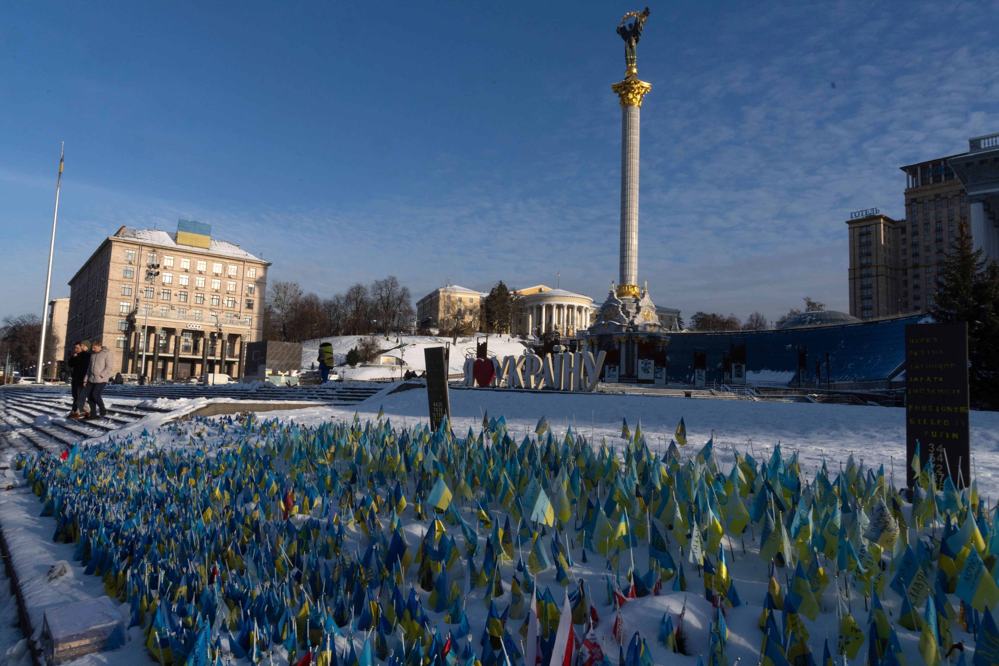 Flags wave at the memorial site for those killed during the war, in Independence Square in Kyiv, Ukraine, Dec. 1, 2022. (AP Photo/Efrem Lukatsky)