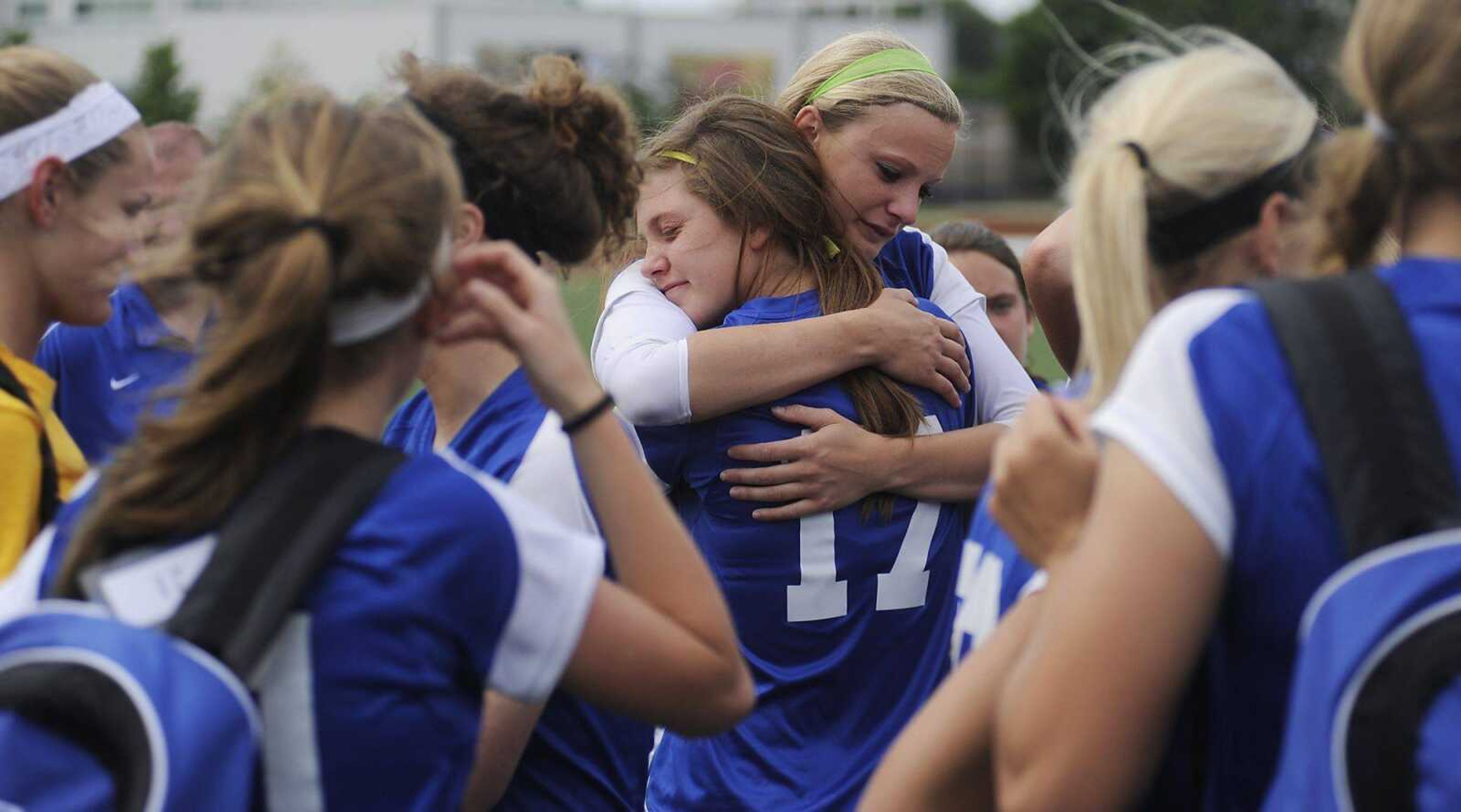 Notre Dame&#8217;s Miranda Fowler, back, and Abby Boyer hug after the Bulldog&#8217; 2-0 loss to the Rosati-Kain Cougars in the Class 2 girls quarterfinal Saturday at St. Louis University High School in St. Louis. (Adam Vogler)