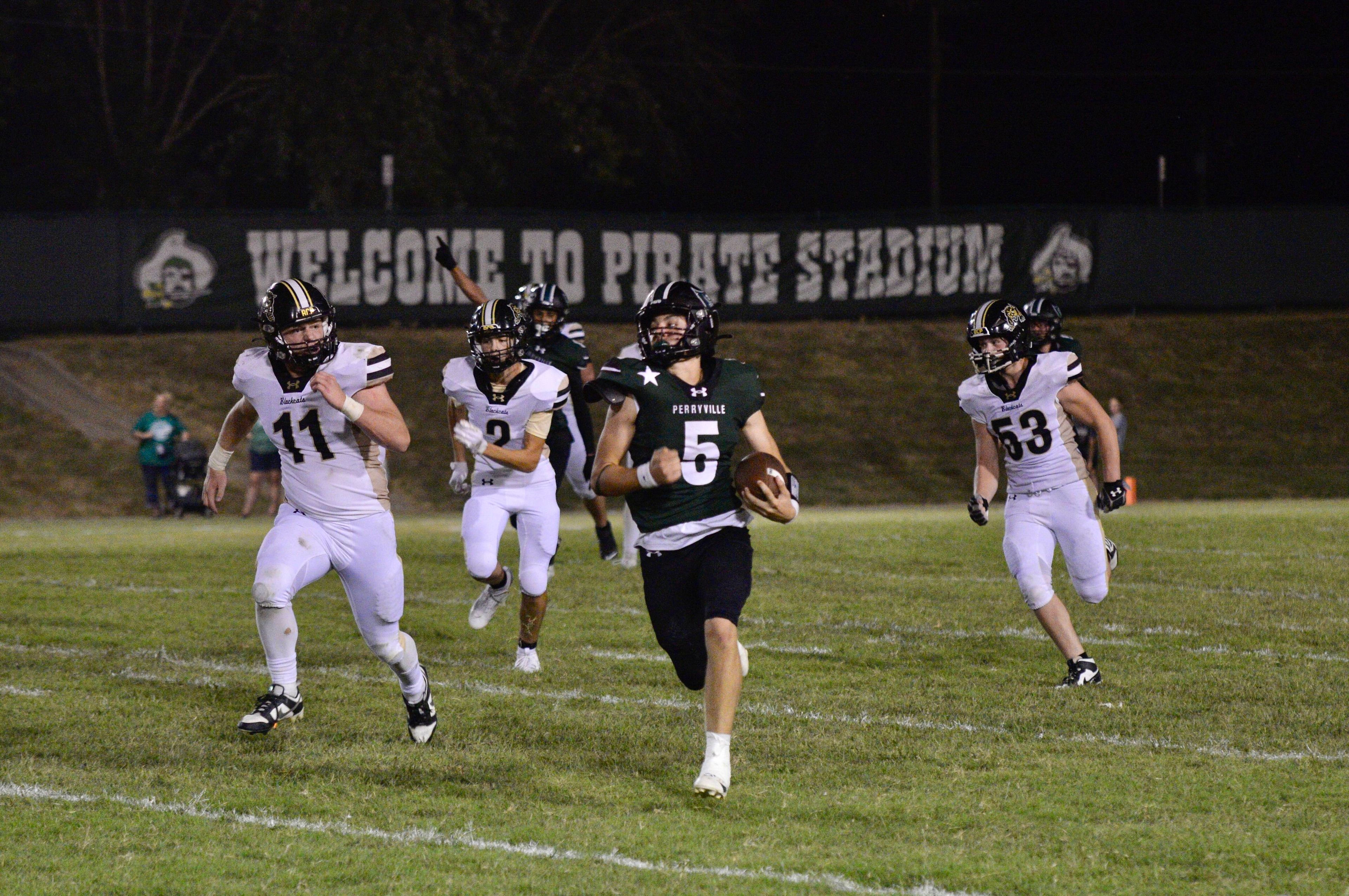 Perryville quarterback Kayd Luckey carries the ball during a touchdown run against Fredericktown on Thursday, Aug. 29, in Perryville, Mo.