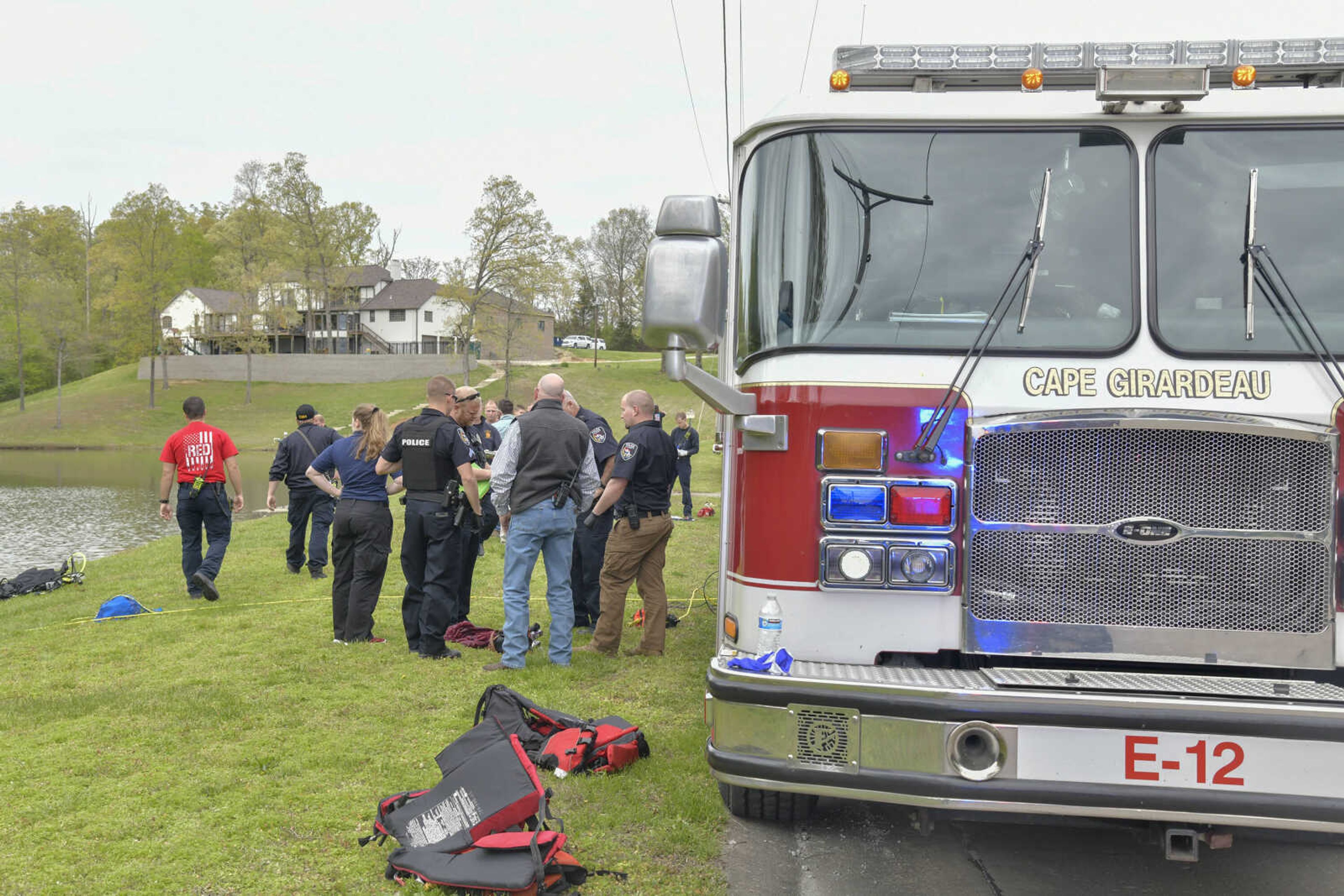 Cape Girardeau Fire and Police departments work at the scene of a submerged car in&nbsp;a pond at&nbsp;Little Ponderosa Lake near the intersection of Prospect Drive and Scenic Drive on Friday, April 16, 2021.