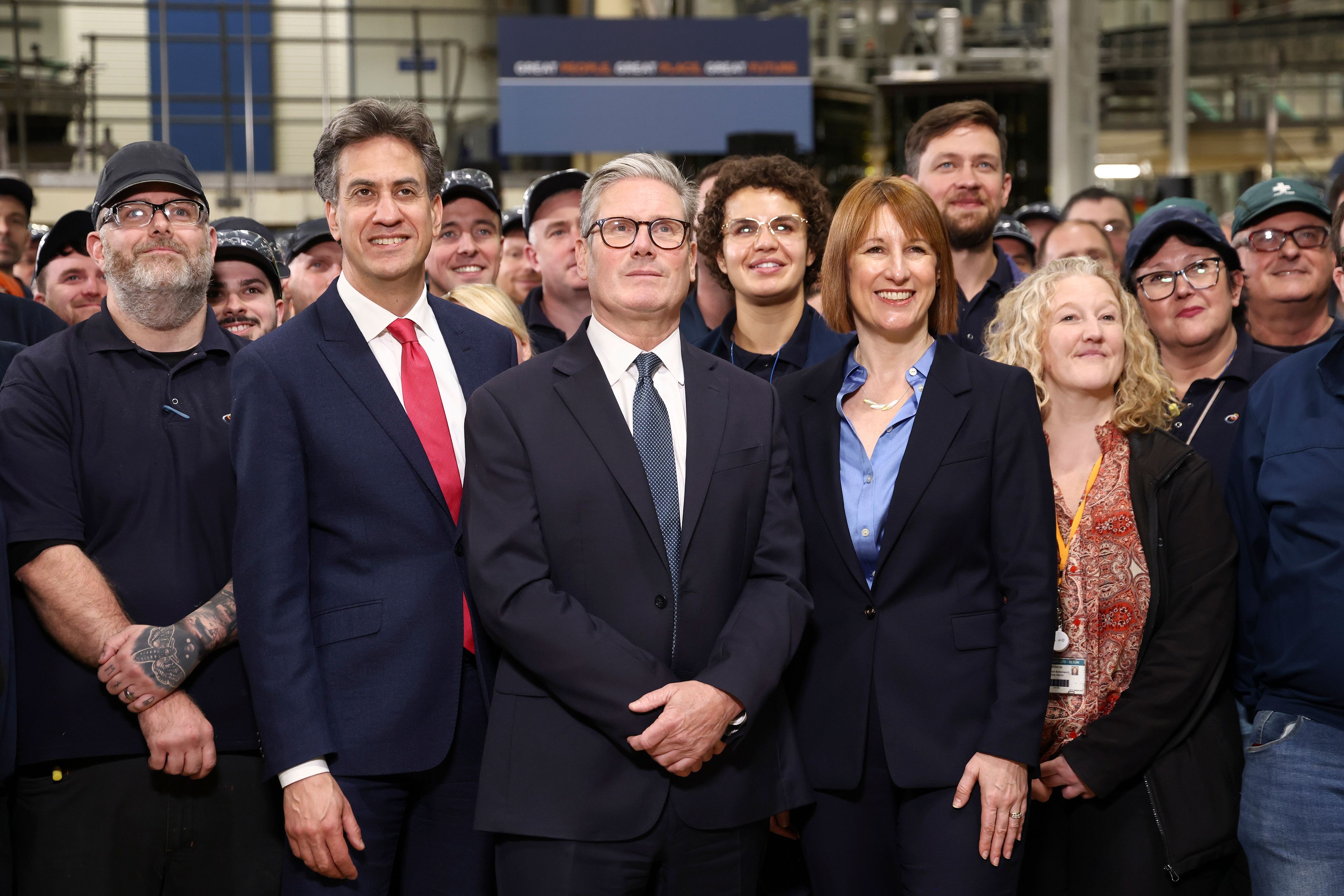 FILE - Britain's Prime Minister Keir Starmer, center, Chancellor of the Exchequer Rachel Reeves, right, and Secretary of State for Energy Security and Net Zero Ed Miliband visit a factory in Chester, England, Friday, Oct. 4, 2024.(AP Photo/Darren Staples, Pool, File)