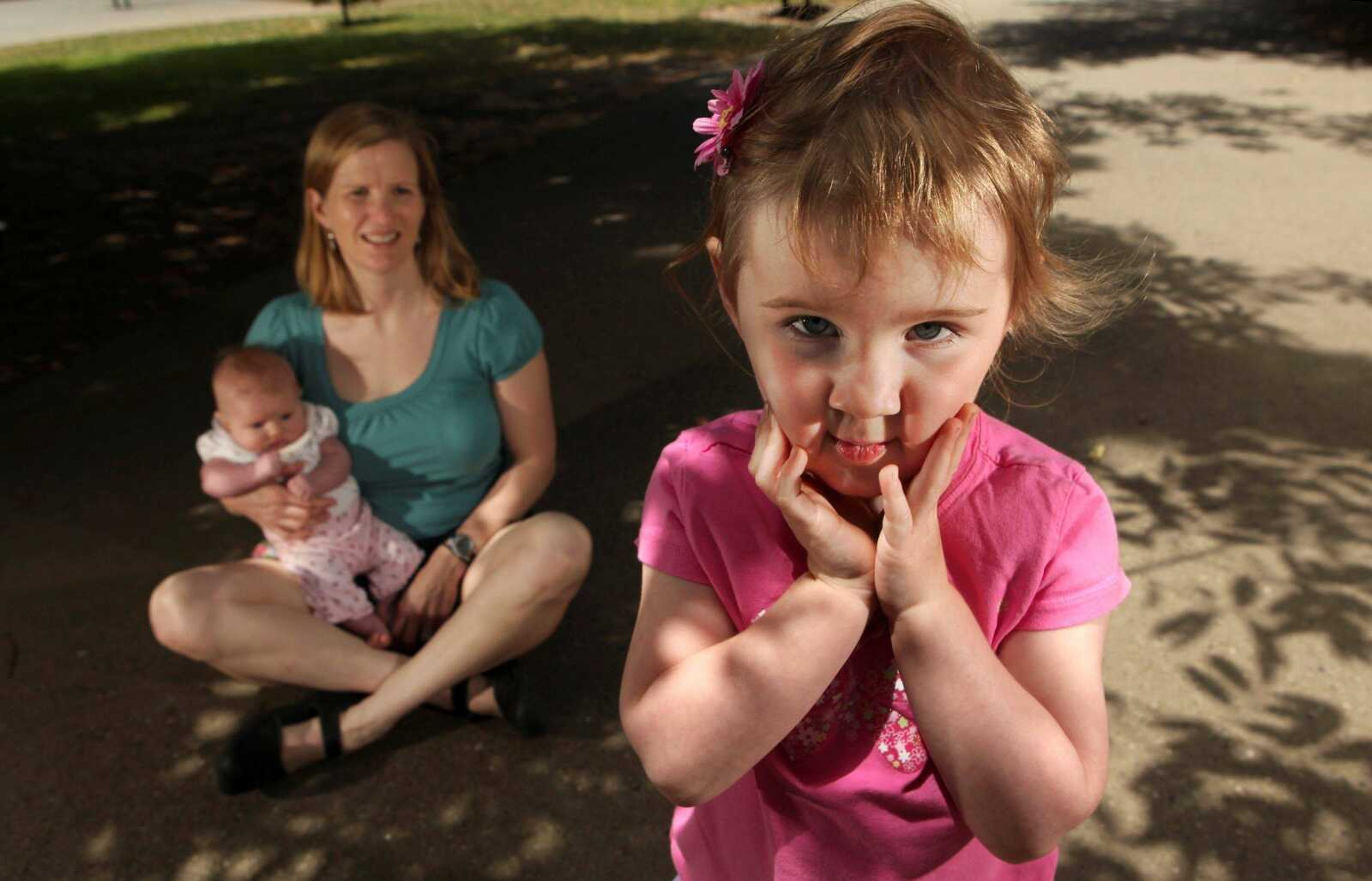 Liz Fosell, 3, right, poses for a photograph June 20 with her mom, Darcy, and 6-week-old sister Kylie in Burlingame, Calif. Darcy Forsell had spent so much on diapers in her daughter's early years that when the time came for Liz to potty-train, Forsell decided to skip the training pants. (JEFF CHIU ~ Associated Press)