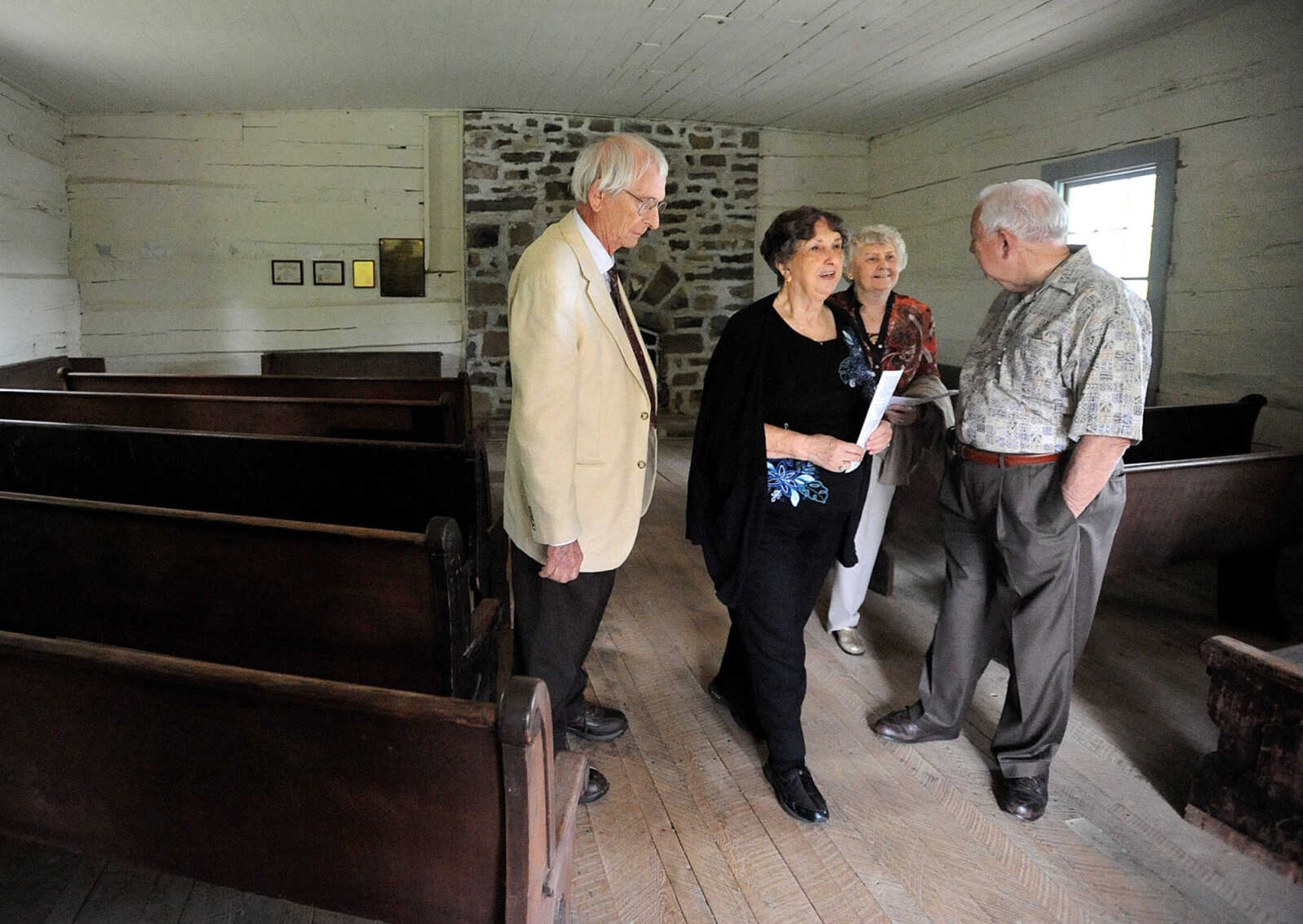 LAURA SIMON ~ lsimon@semissourian.com
From left, Rev. Billy Hahs, Mary Jane Statler, Elouise Hahs and Rev. Jerry Statler visit the interior of Old McKendree Chapel Sunday, Sept. 30, 2012 during the annual pilgrimage worship gathering at the chapel in Jackson, Mo. The chapel was built in 1819 and is known as the oldest Protestant church standing west of the Mississippi River.