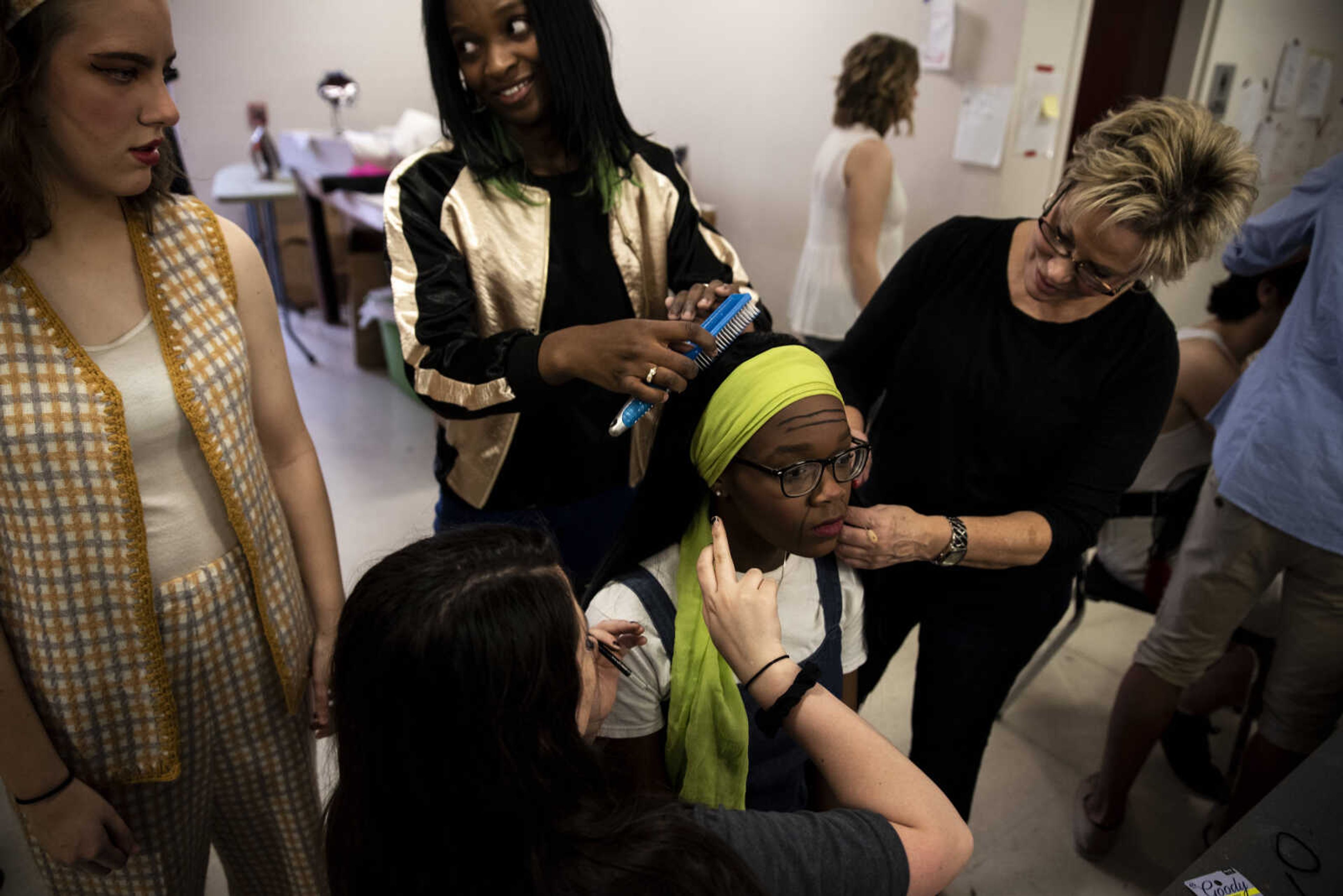 Peighton Robinson sits as her hair and makeup is finalized before she takes the stage as Donna Sheridan during the media night of Cape Central High School's spring musical production of "Mamma Mia!" Wednesday, April 10, 2019, in Cape Girardeau.