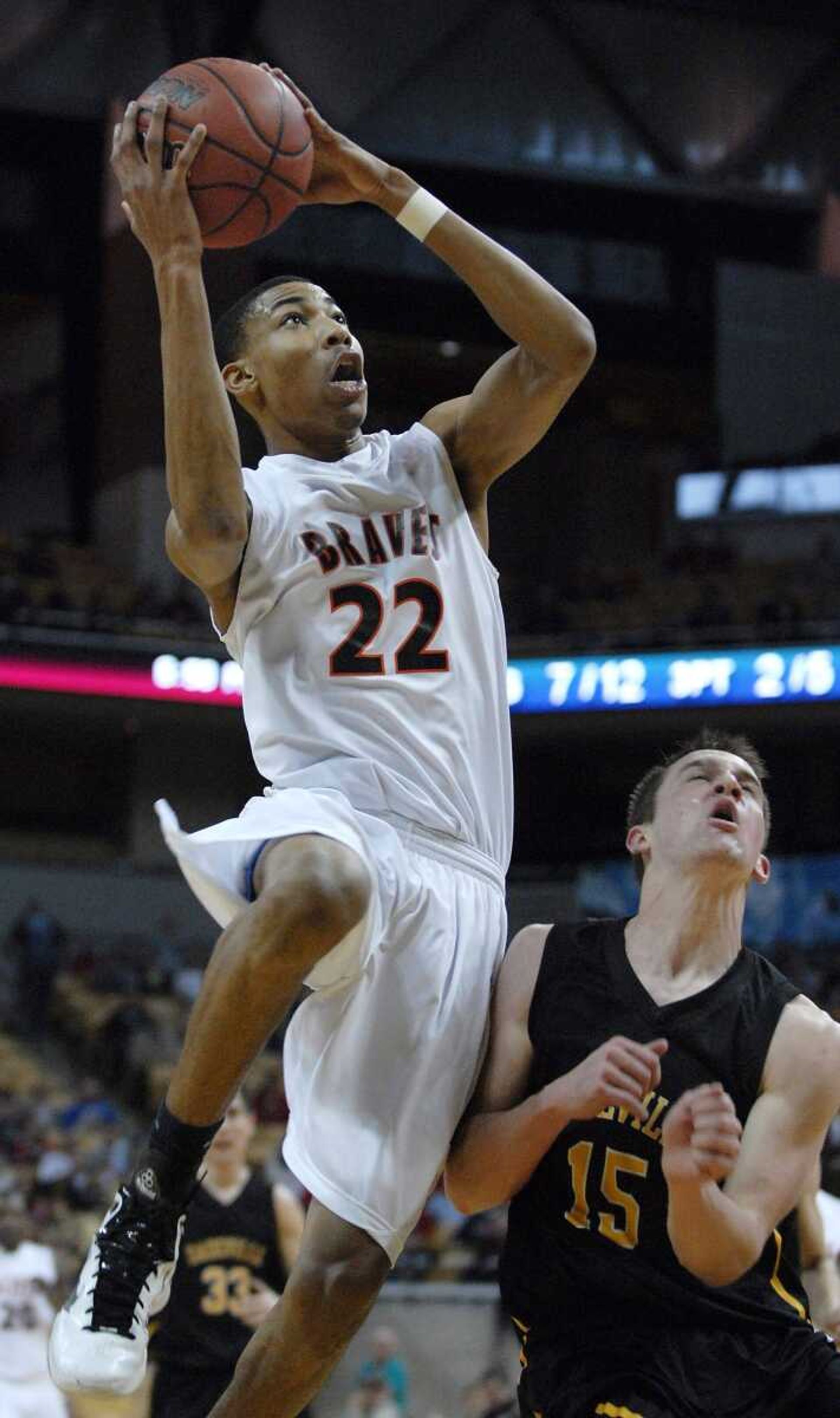 Scott County Central's Otto Porter shoots over Dadeville's Jacob Goodman during the first quarter of the Class 1 championship game Saturday in Columbia, Mo.