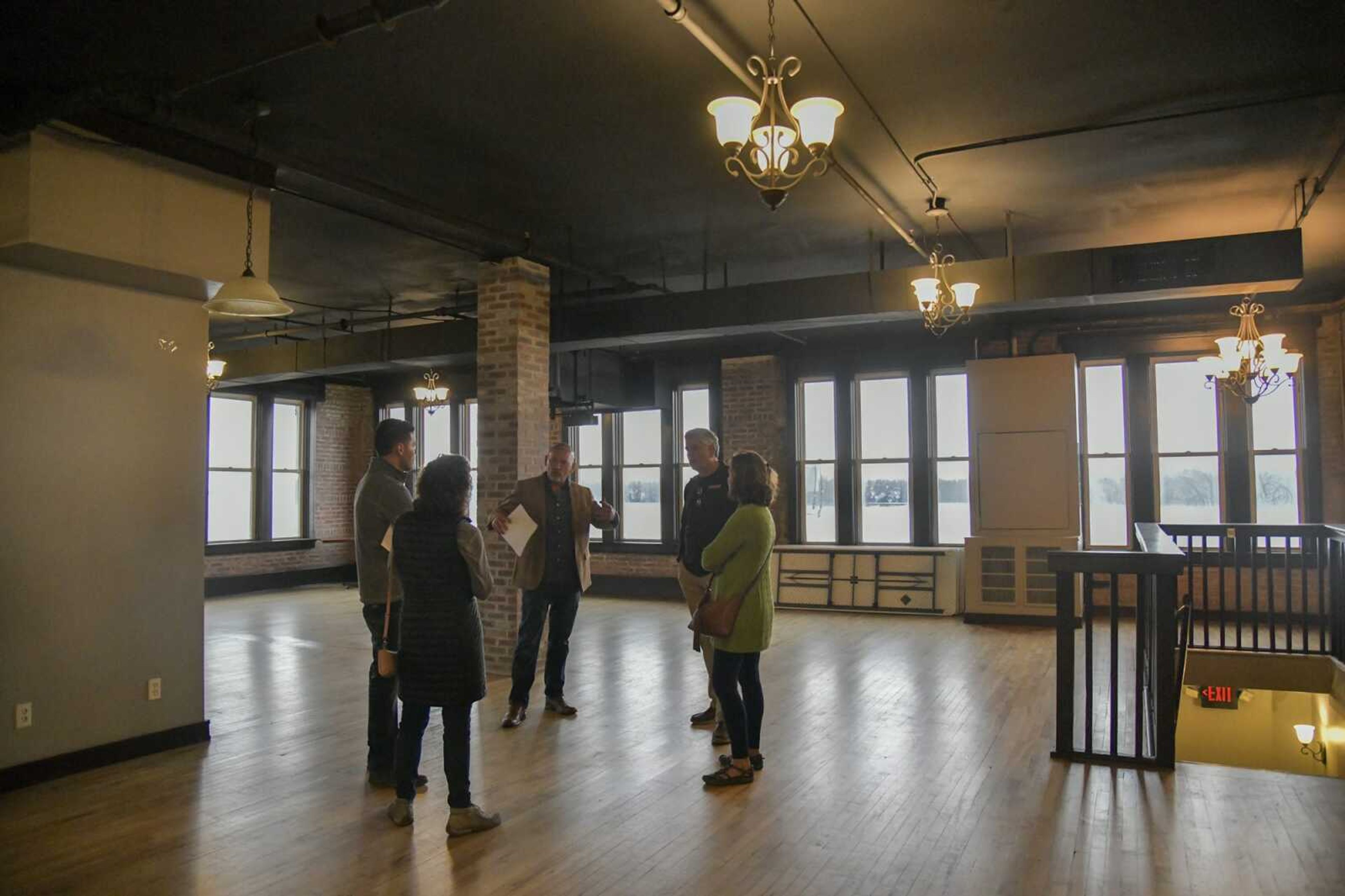 Broker Bobby Gray of Gray & CO gives a tour of the former Ragsdales Pub at 132 N. Main St. to a group during Thursday's Downtown Cape Vacant Property Open House in Cape Girardeau. The open house tours were sponsored by Old Town Cape to promote downtown real estate  to anyone interested in starting or expanding a business or commercial venture. There were at least 16 properties in Thursday's showcase.