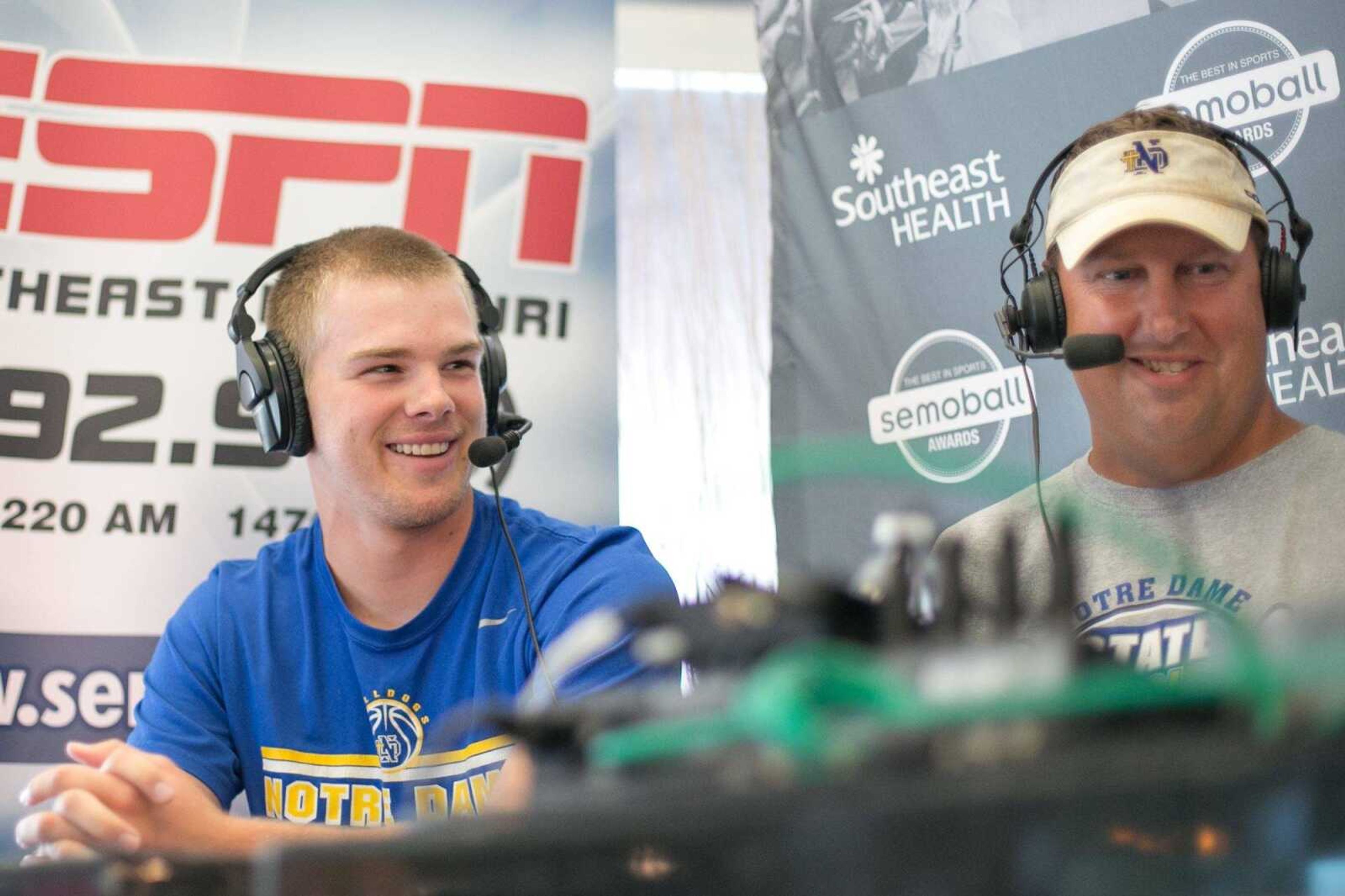 Notre Dame baseball player Derek Hulshof and coach Jeff Graviett answer questions during an interview at the Semoball Awards spring sports selection show at First Midwest Bank Saturday, June 13, 2015 in Cape Girardeau. (Glenn Landberg)