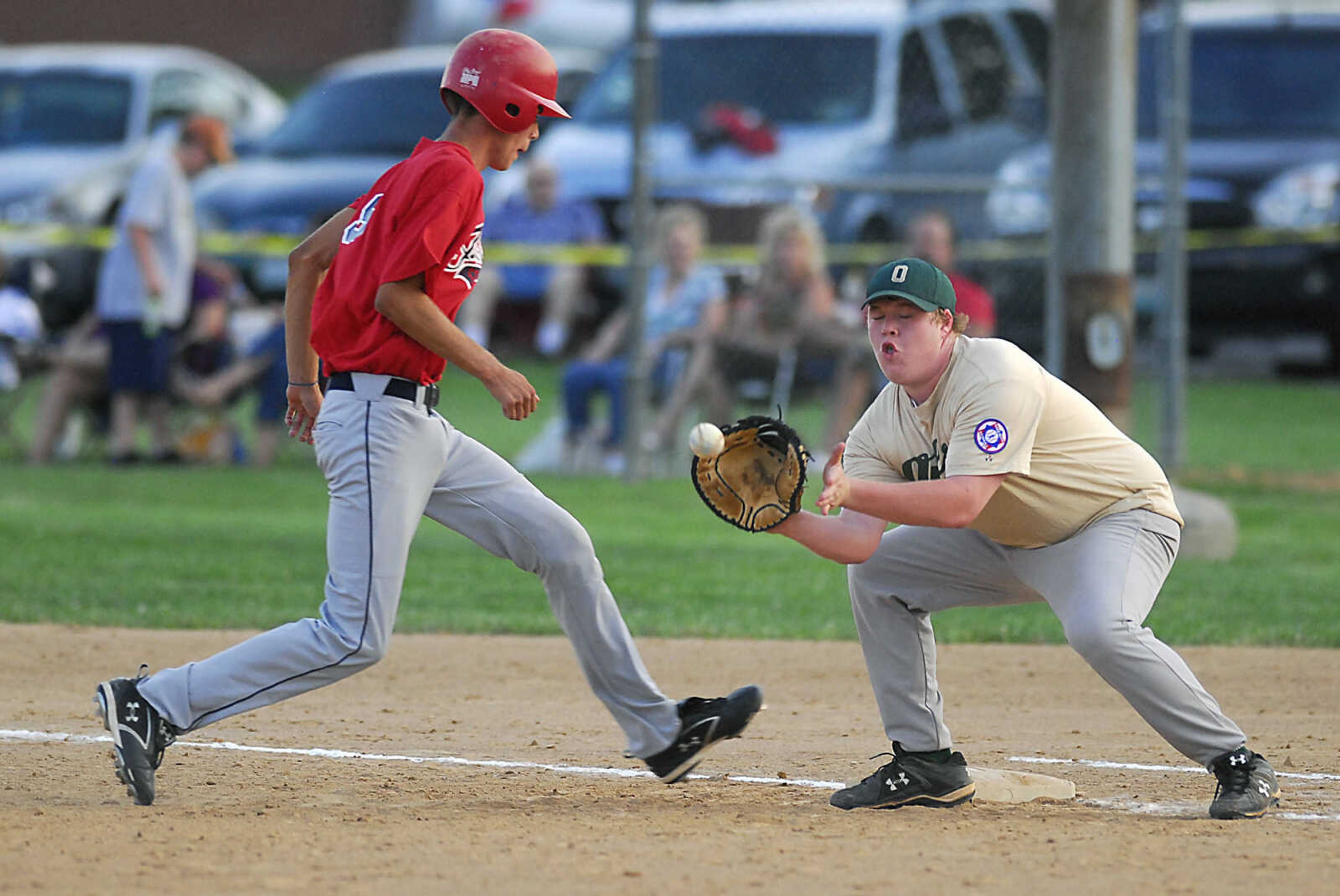 KIT DOYLE ~ kdoyle@semissourian.com
Jackson Sr. Babe Ruth's  Bret Steffens safely returns to first base as Josh St. Mary takes the throw Friday, July 24, 2009, at Jackson City Park.