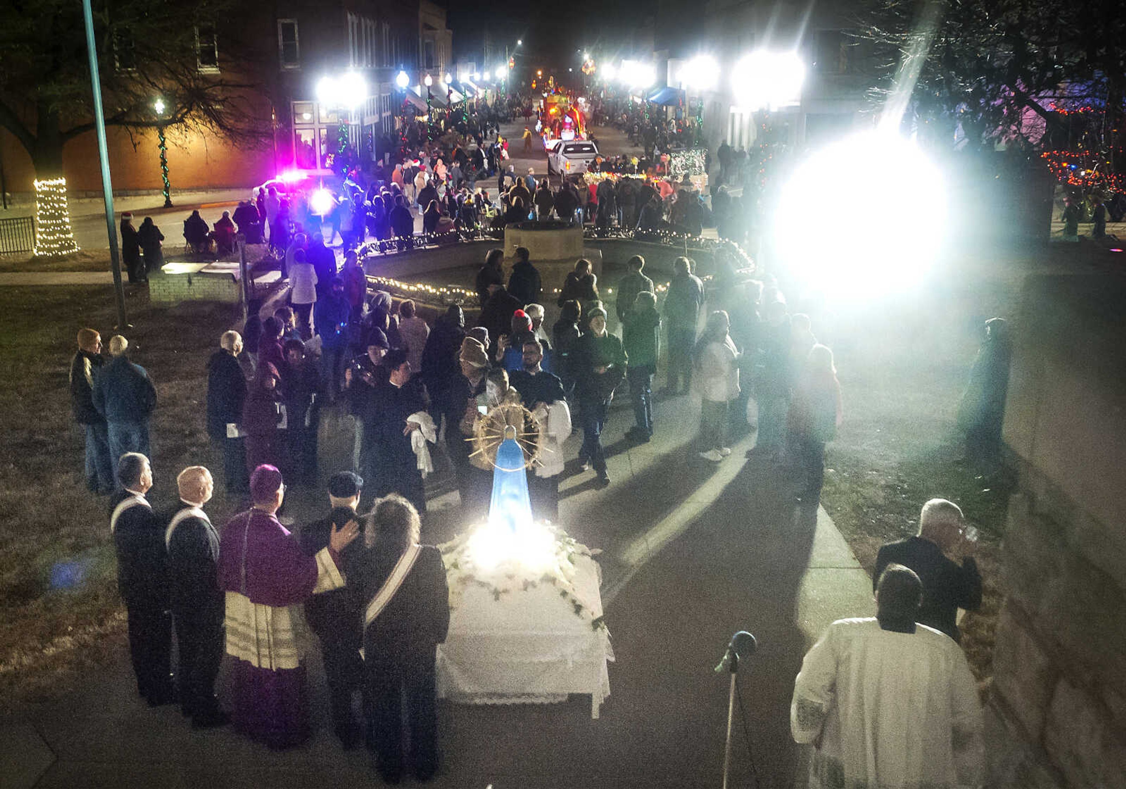 Bishop Edward Rice speaks to Immaculate Conception Catholic Church members and Catholic clergymen walk in a Marian procession Sunday, Dec. 8, 2019, to recognize the church's 170-year anniversary and mark the beginning of the church's capital campaign to build a new church building in Jackson.