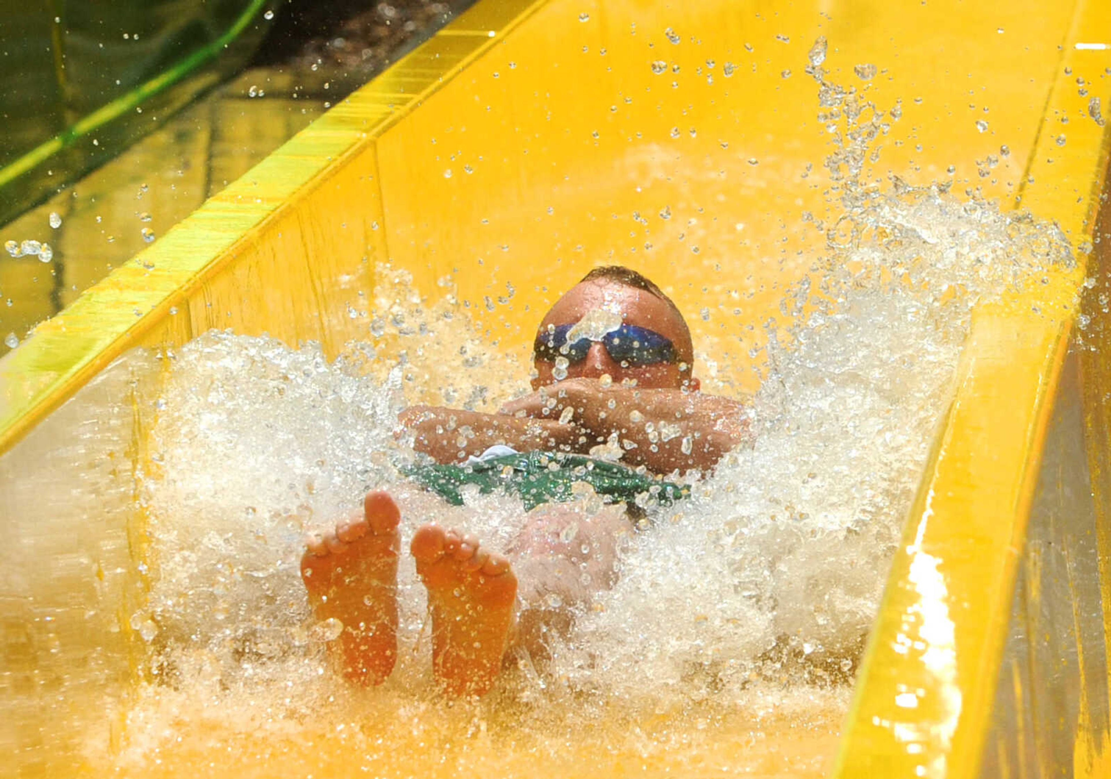 LAURA SIMON ~ lsimon@semissourian.com

The Cape Girardeau Parks and Recreation Department opened the new 265-foot-long free-fall slide, 259-foot-long triple-drop slide and a three-Lane 319-foot-long mat racer with 30-foot tower, at Cape Splash Family Aquatic Center, Thursday, July 9, 2015.