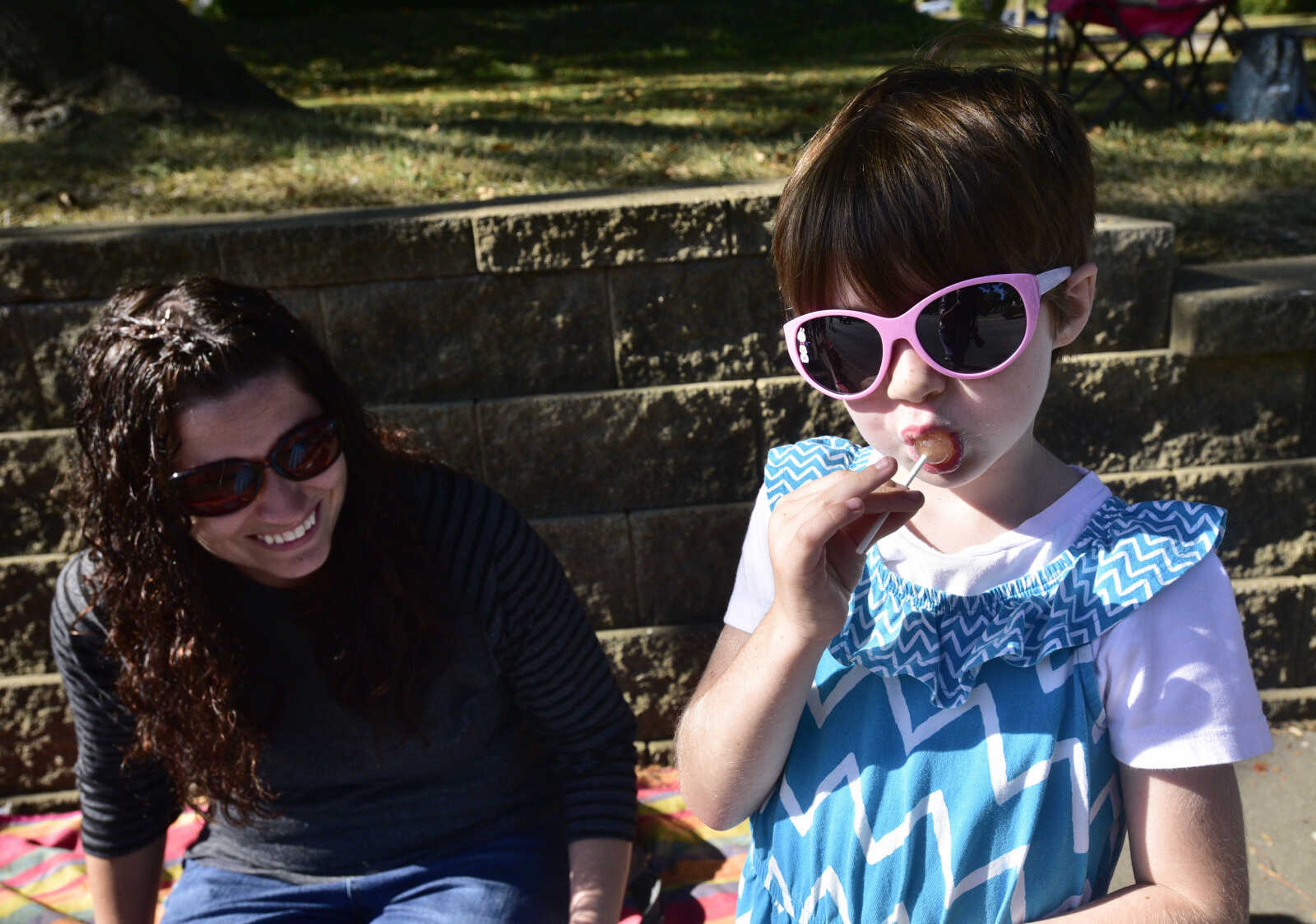 Jami Obmermann and her daughter Elizabeth Obmermann, 5, watch during the SEMO District Fair parade Saturday, Sept. 9, 2017 in Cape Girardeau.