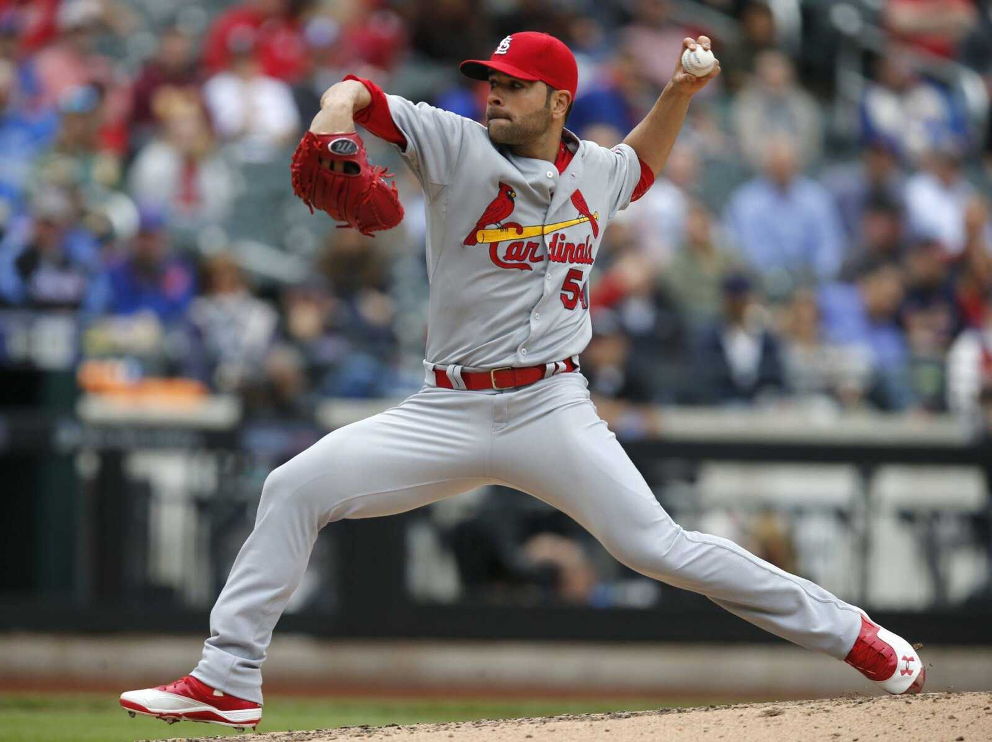 Cardinals starter Jaime Garcia delivers a pitch to a Mets batter during the fourth inning Thursday in New York. Garcia gave up two runs over seven innings in his first start since early last season. (Kathy Willens ~ Associated Press)