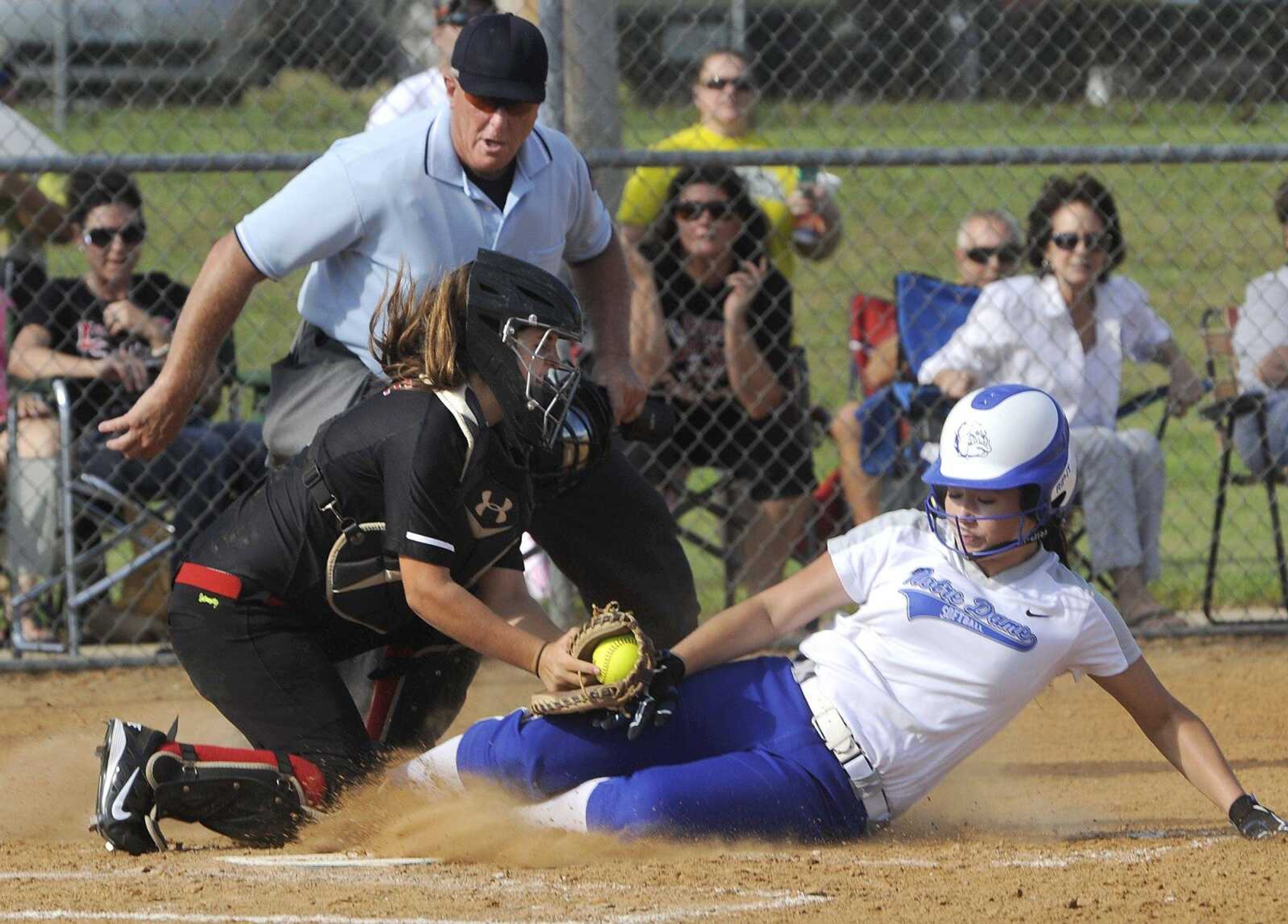 Chaffee catcher Bailey Wiseman tags out Notre Dame's Hallie Bollinger at the plate during the second inning Wednesday, Aug. 24, 2016 at Notre Dame Regional High School.