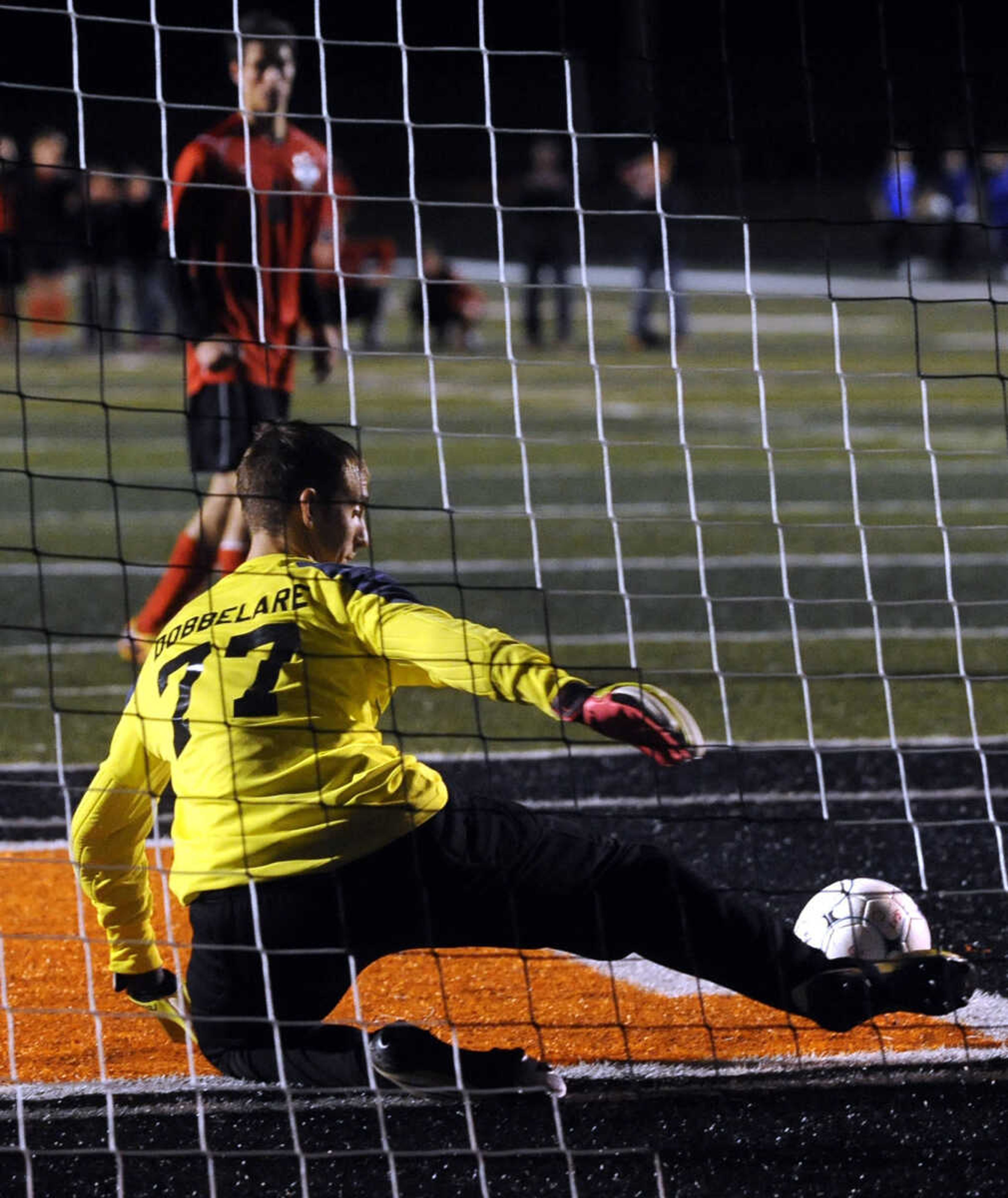 FRED LYNCH ~ flynch@semissourian.com
Perryville goalie Luke Dobbelare stops Sikeston's final penalty kick after double overtime for Perryville to win the Class 3 District 1 soccer semifinal Tuesday, Nov. 5, 2013 at Central High School.