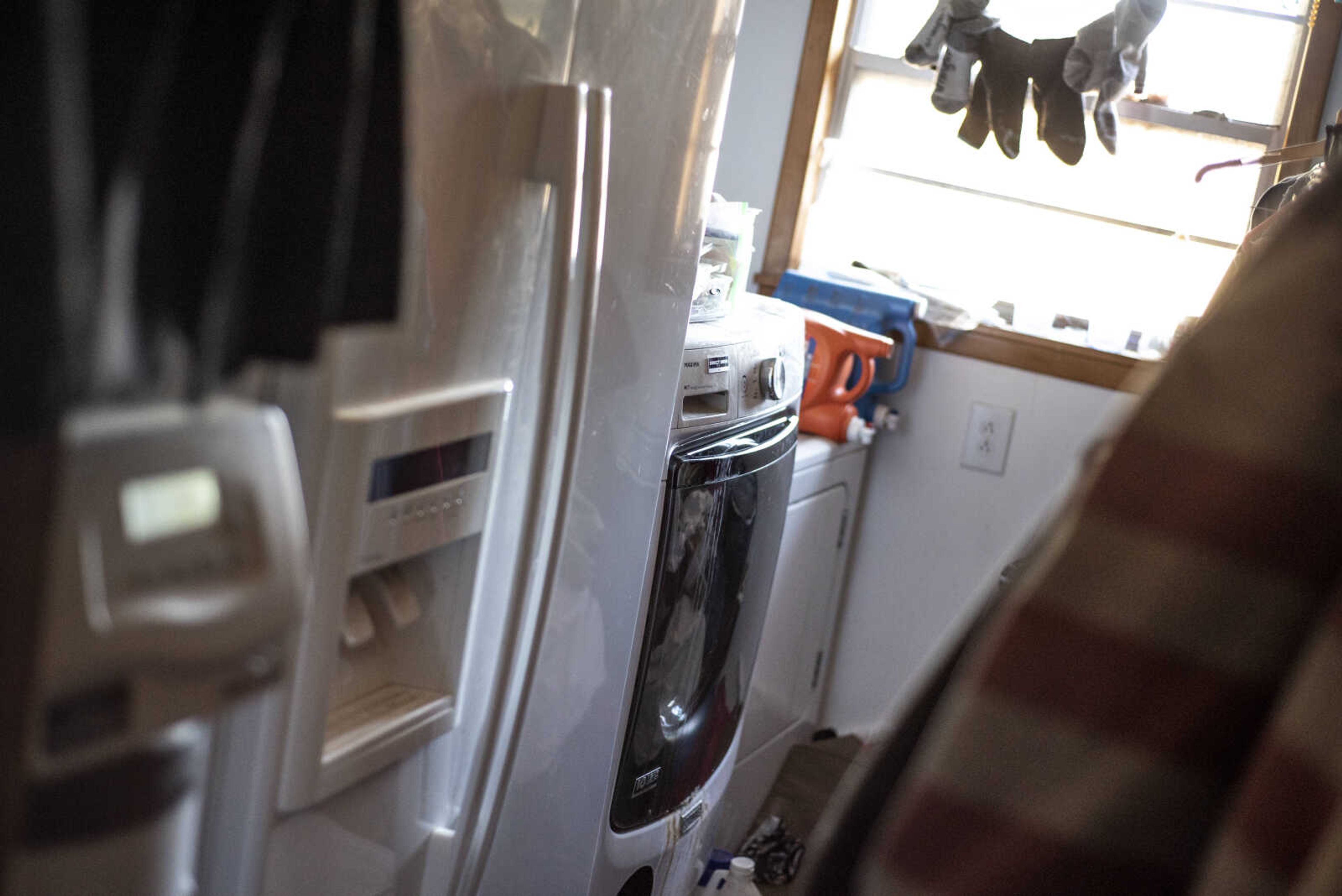 The cramped laundry room space of Marilyn and Michael Neville's home, where the Bollinger County Stray Project is based, is seen Wednesday, Jan. 9, 2019, in Zalma.