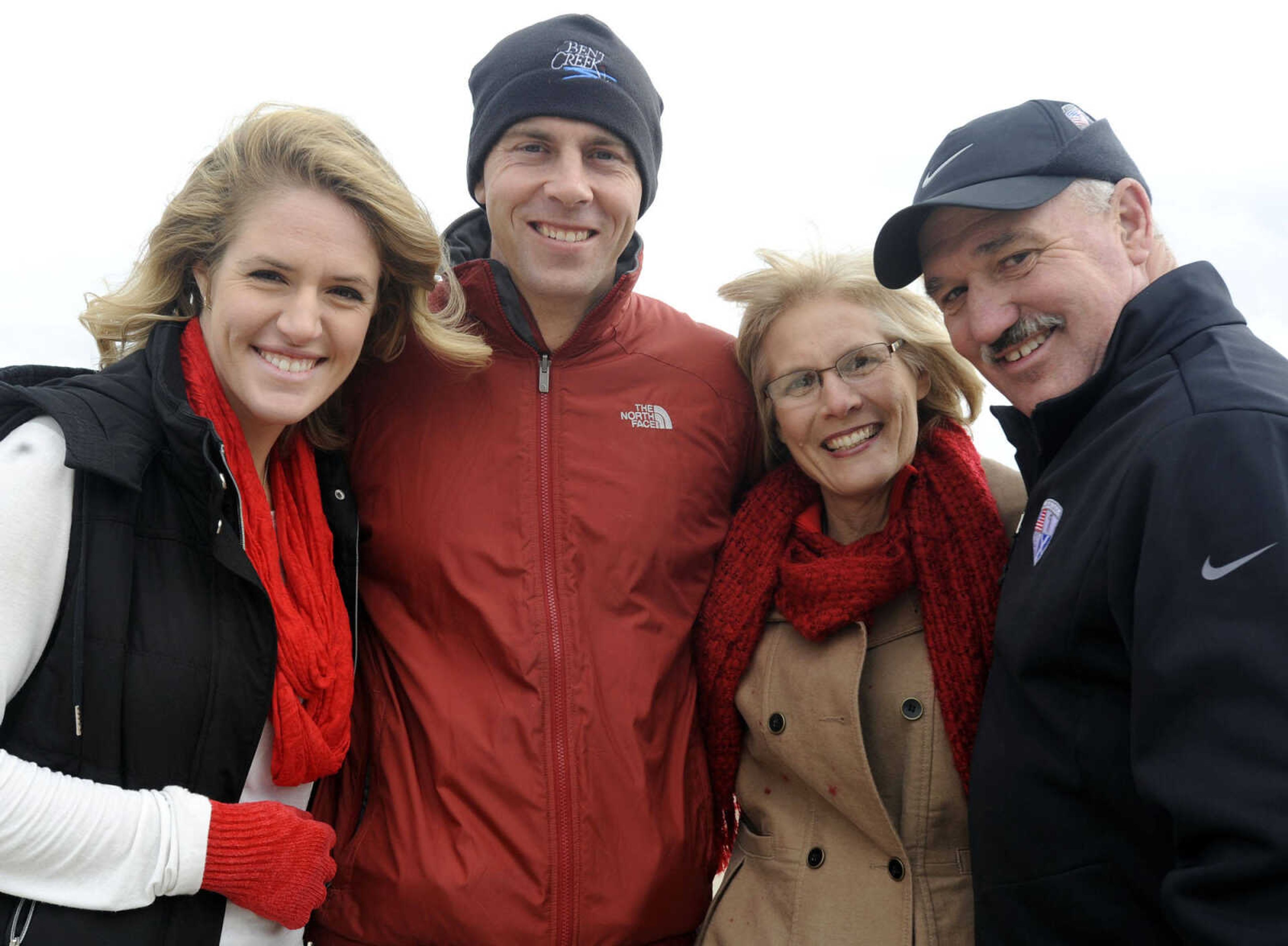 Emily Obergoenner, left, Todd Obergoenner, Susan Matthews and Mark Matthews pose at a tailgate before the SEMO Homecoming game Saturday, Oct. 26, 2013 in Cape Girardeau.