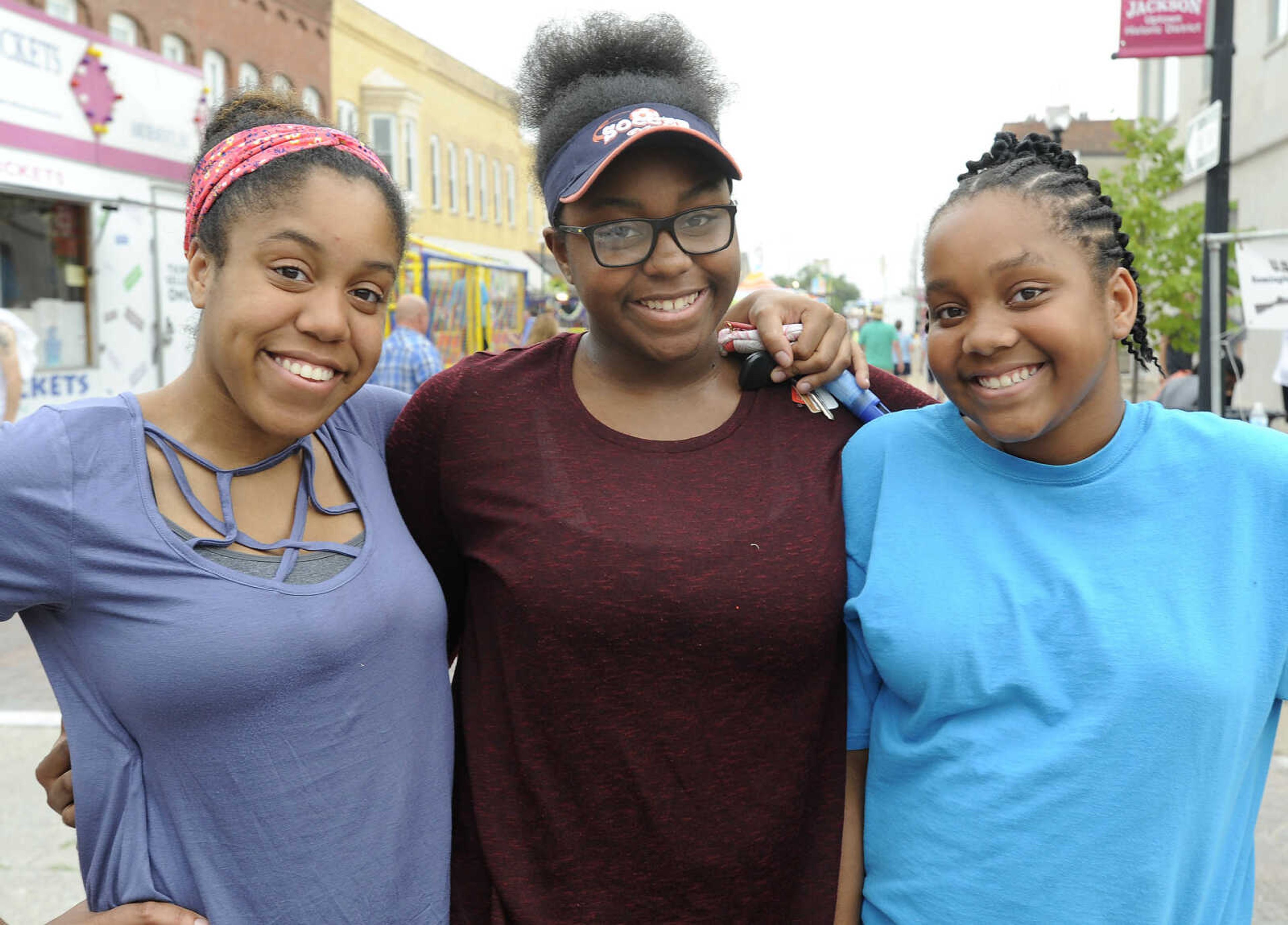 FRED LYNCH ~ flynch@semissourian.com
Donysha Lanier, left, Samyiah Lanier and Danielle Lanier pose for a photo Wednesday, July 26, 2017 at Homecomers in Jackson.