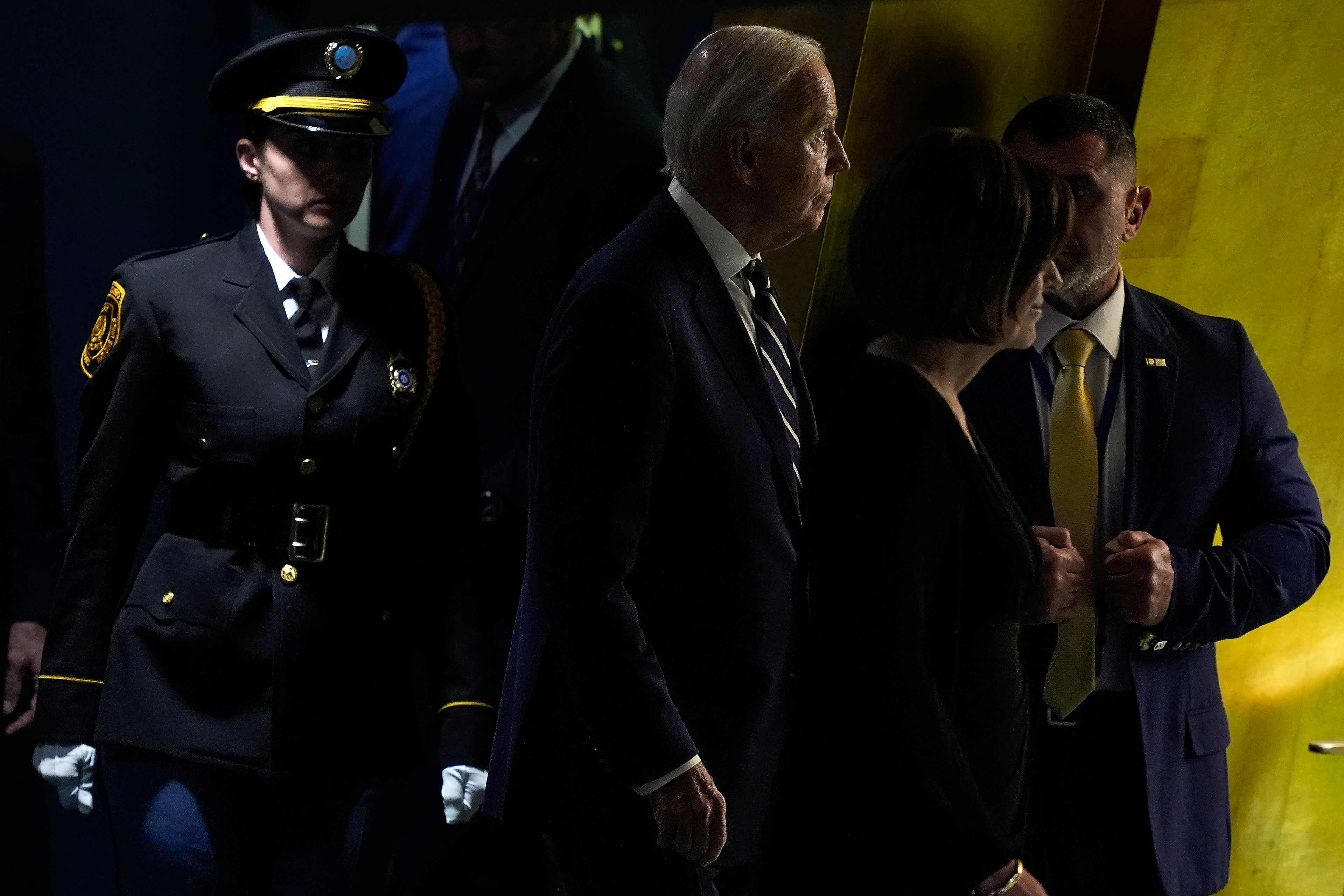 United States President Joe Biden, center, arrives to address the 79th session of the United Nations General Assembly, Tuesday, Sept. 24, 2024, at UN headquarters. (AP Photo/Julia Demaree Nikhinson)