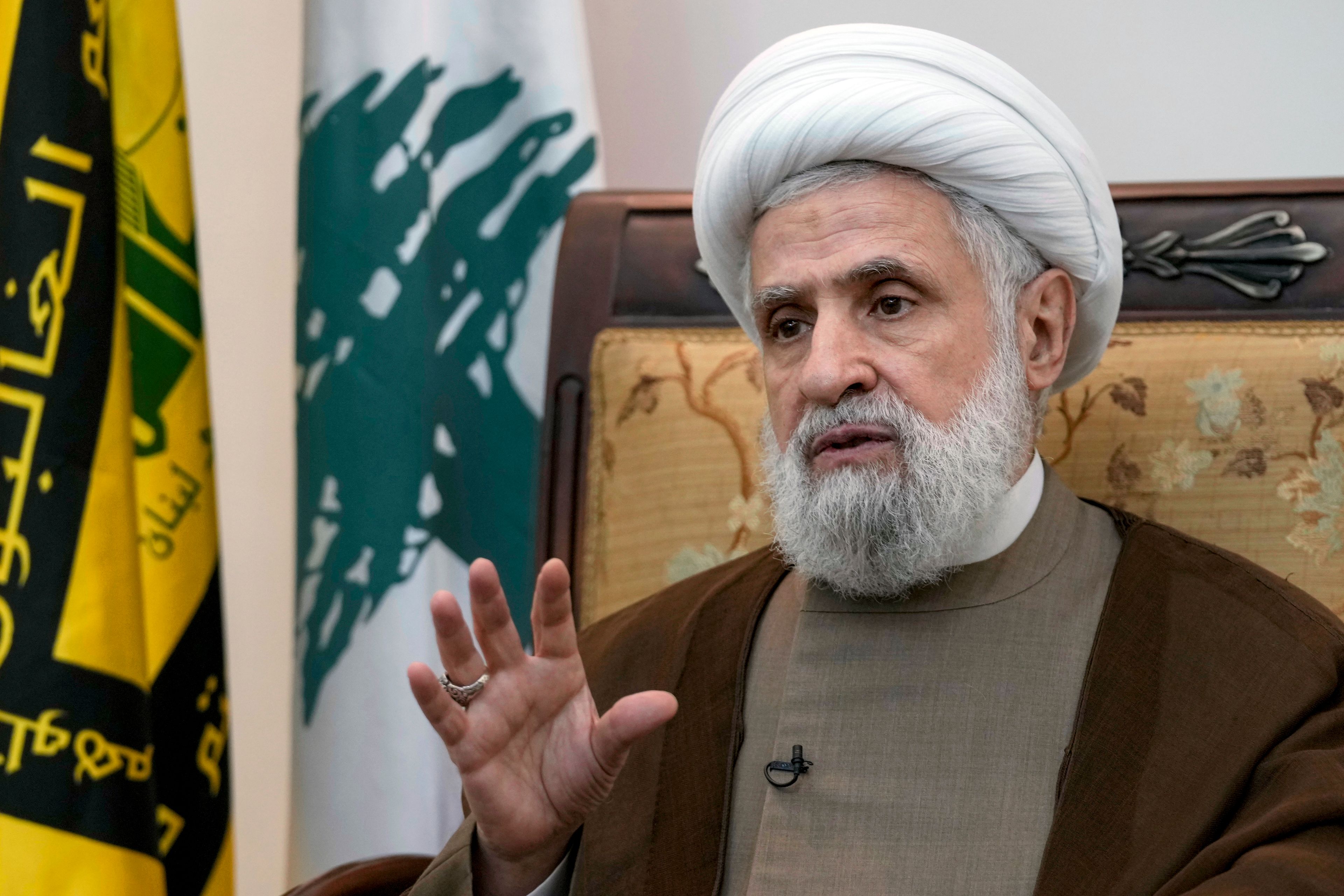 Hezbollah's deputy leader, Sheikh Naim Kassem, speaks during an interview with The Associated Press in Beirut's southern suburbs, Tuesday, July 2, 2024. (AP Photo/Bilal Hussein)