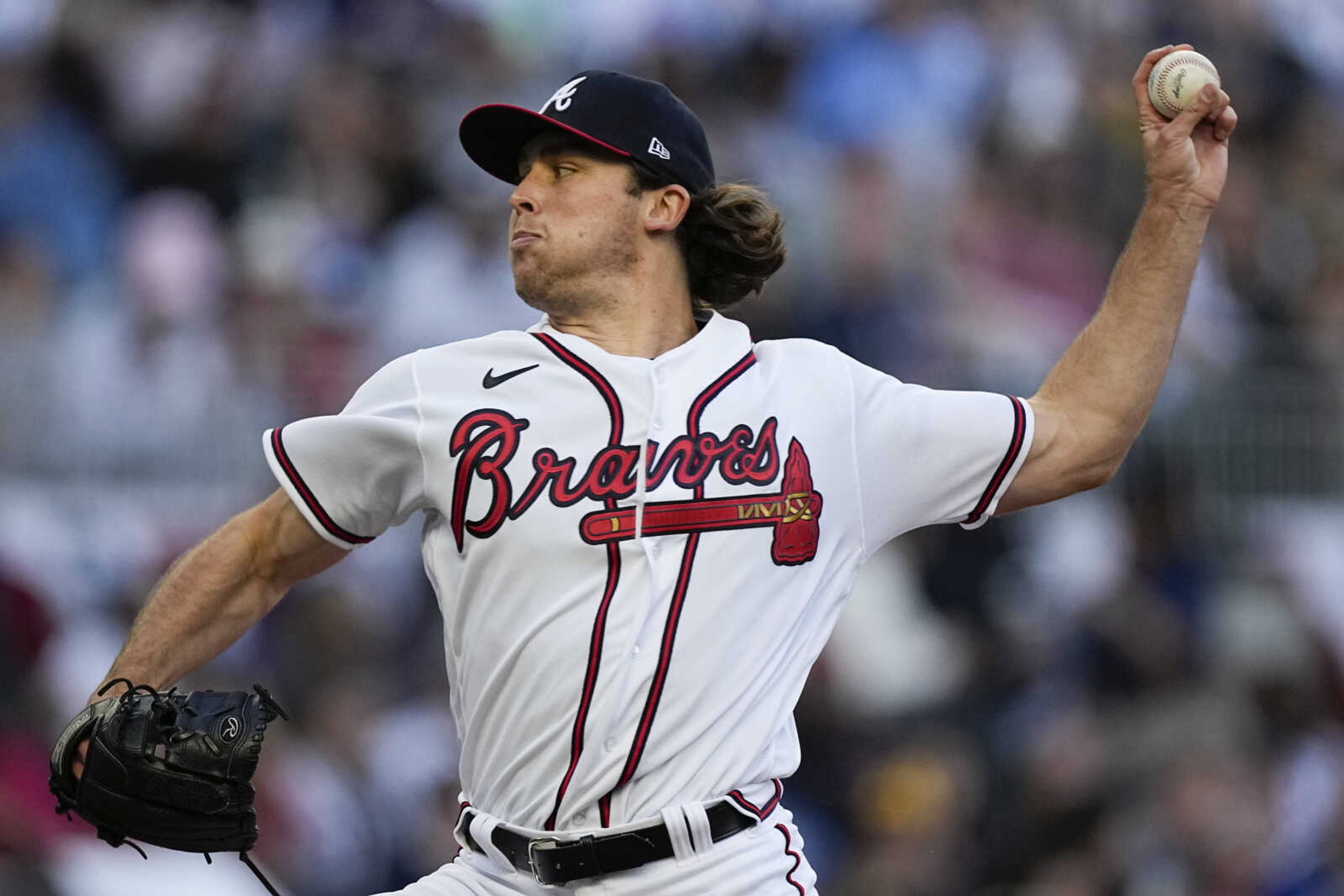 Atlanta Braves starting pitcher Dylan Dodd (46) delivers in the first inning of a baseball game against the San Diego Padres, Sunday, April 9, 2023, in Atlanta.