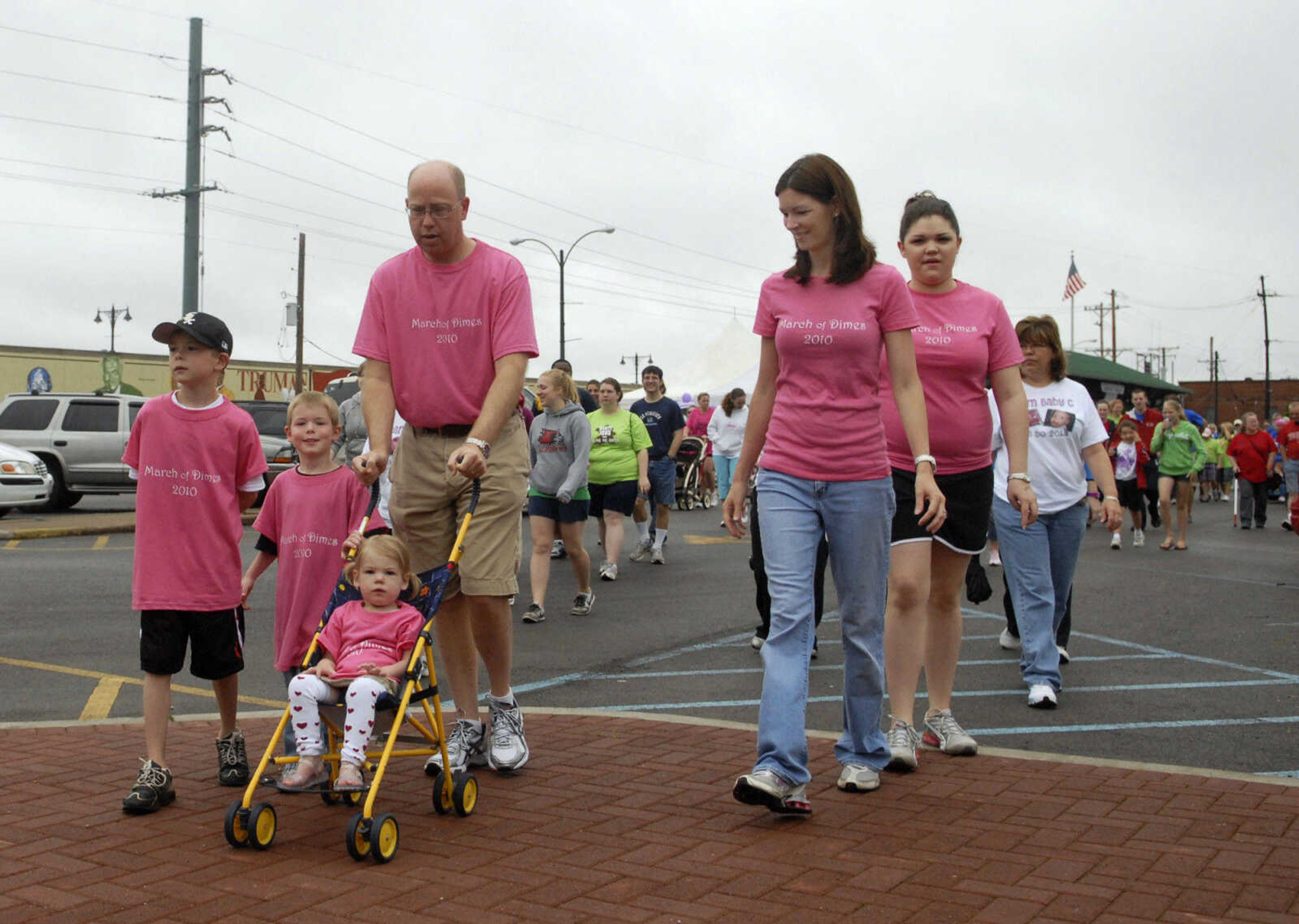 KRISTIN EBERTS ~ keberts@semissourian.com

March of Dimes Ambassador Family from left, Parker Lipke, 8, Layton Lipke, 6, Scott Lipke, Kate Lipke, 2, Ashley Lipke, and family friend and babysitter Bailey Payne lead the March for Babies in Cape Girardeau, Mo., on Saturday, May 1, 2010.