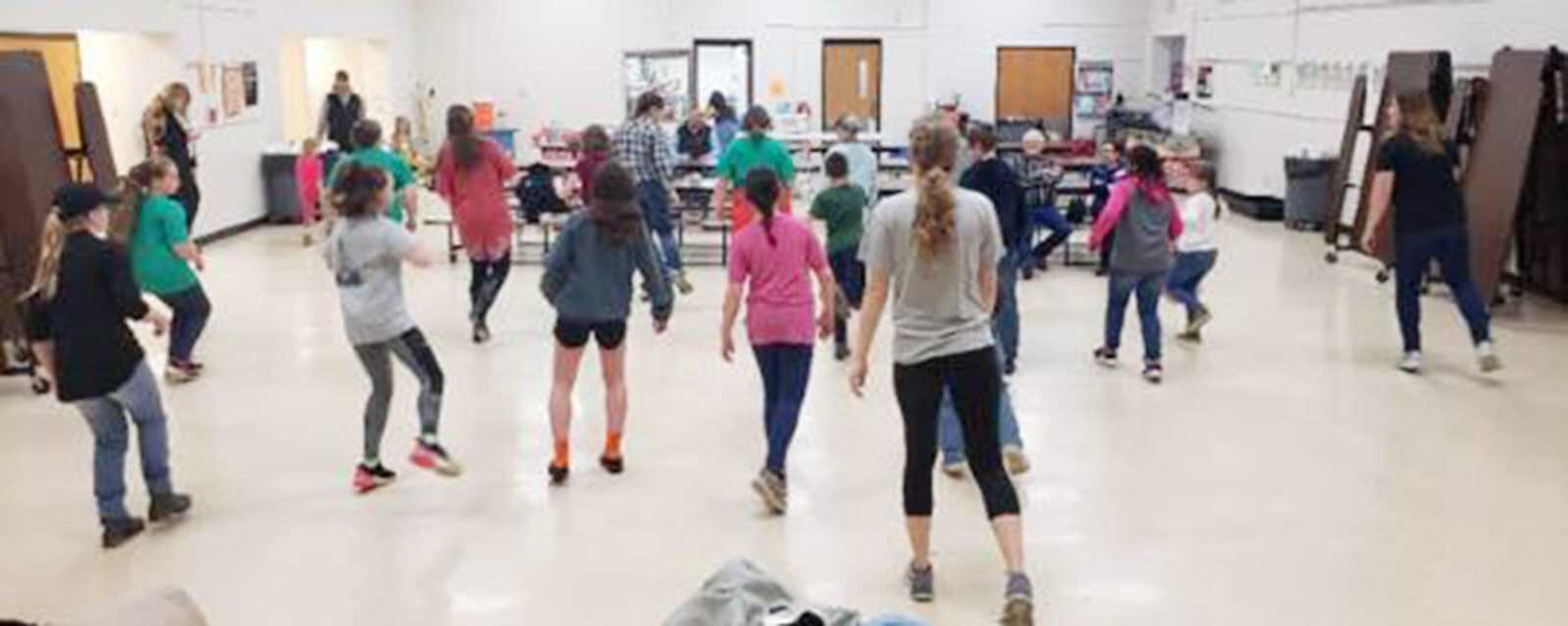 A favorite activity of Southeast 4-H youth is dancing. Renee Peters, Hannah Aufdenberg and Lauren McClanahan taught groups of youth several line dances.