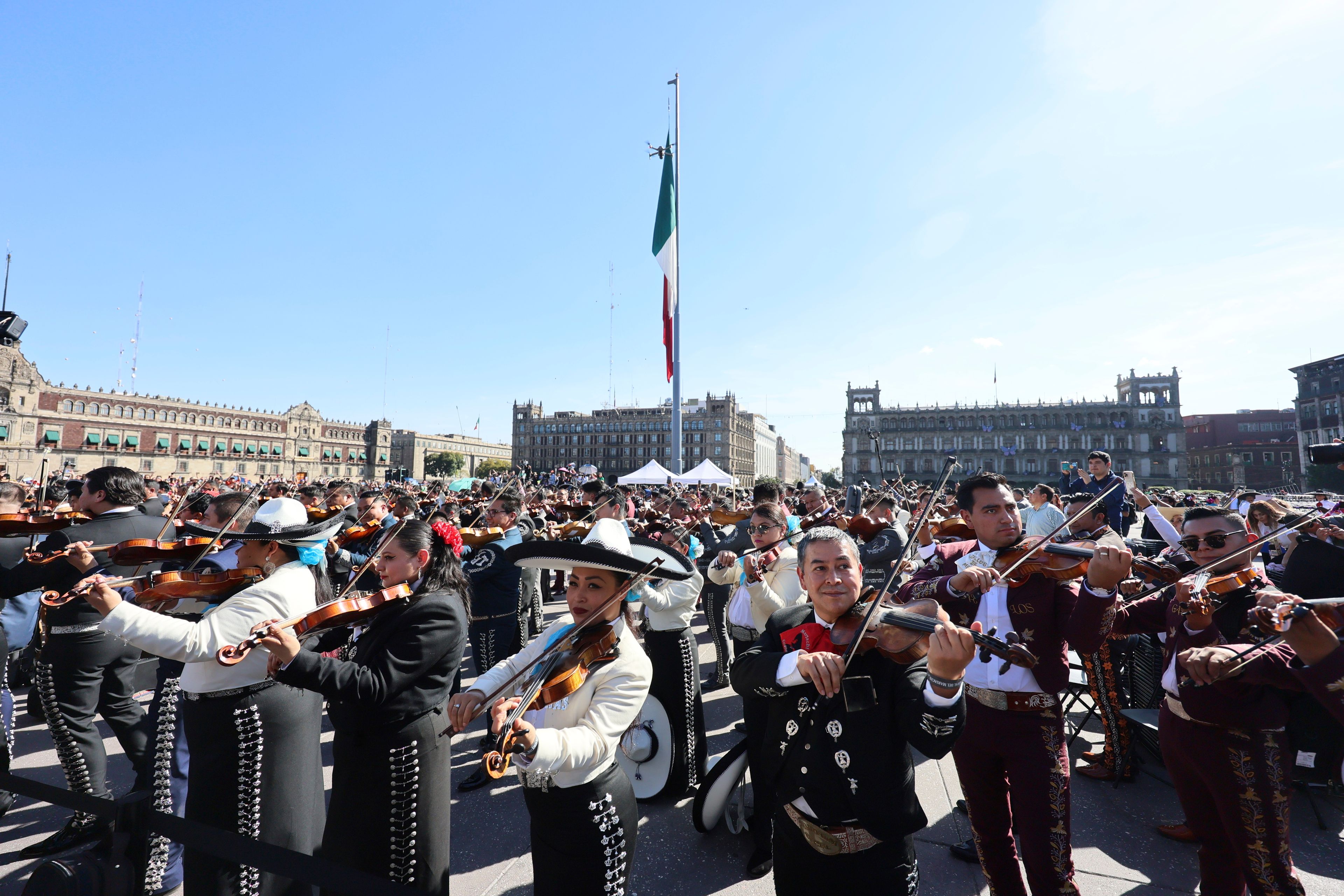 Musicians gather to break the record of most mariachis performing in unison, at the Zocalo, Mexico City's main square, Sunday, Nov. 10, 2024. (AP Photo/Ginnette Riquelme)