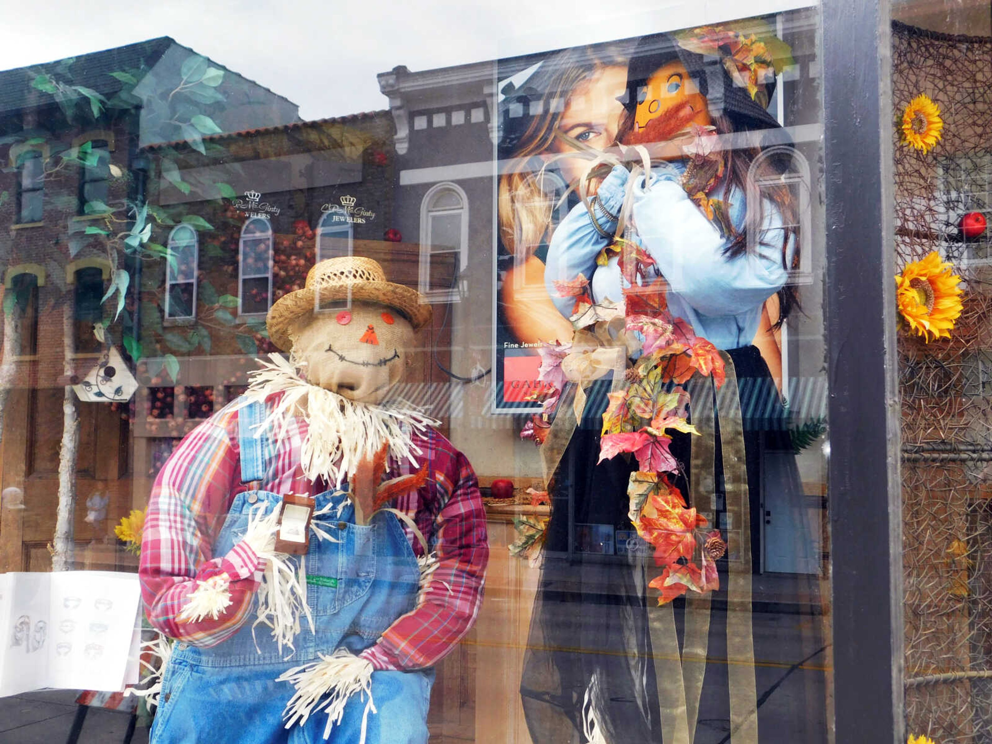 Two sales associates at C.P. McGinty Jewelers thought an engagement scene would be perfect for their store's participation in this year's Scarecrow Stroll. They spent the first half of October designing the display.